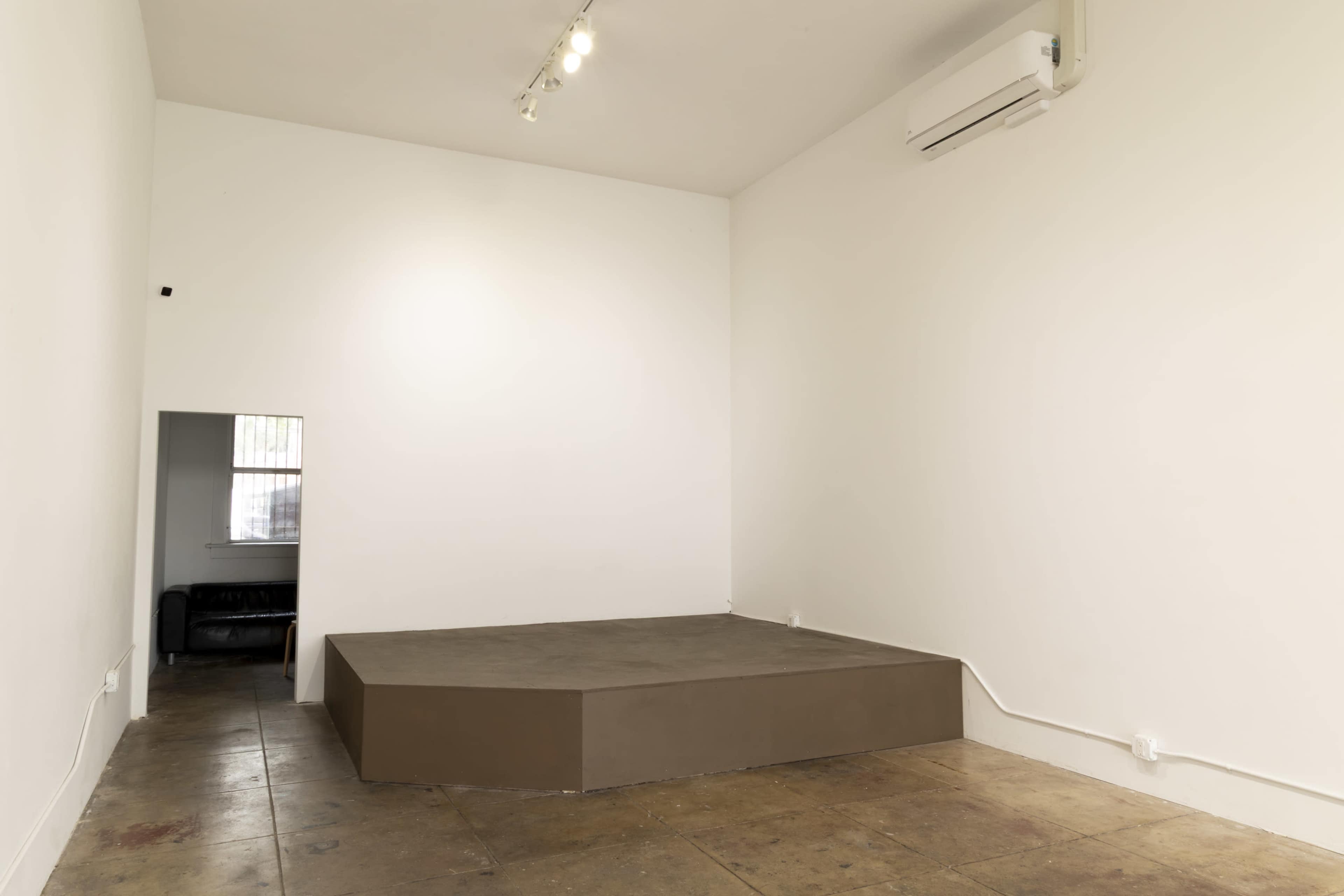 Lofty and sleek gallery and pop-up event space featuring an outdoor patio Image in Central LA, Los Angeles, CA