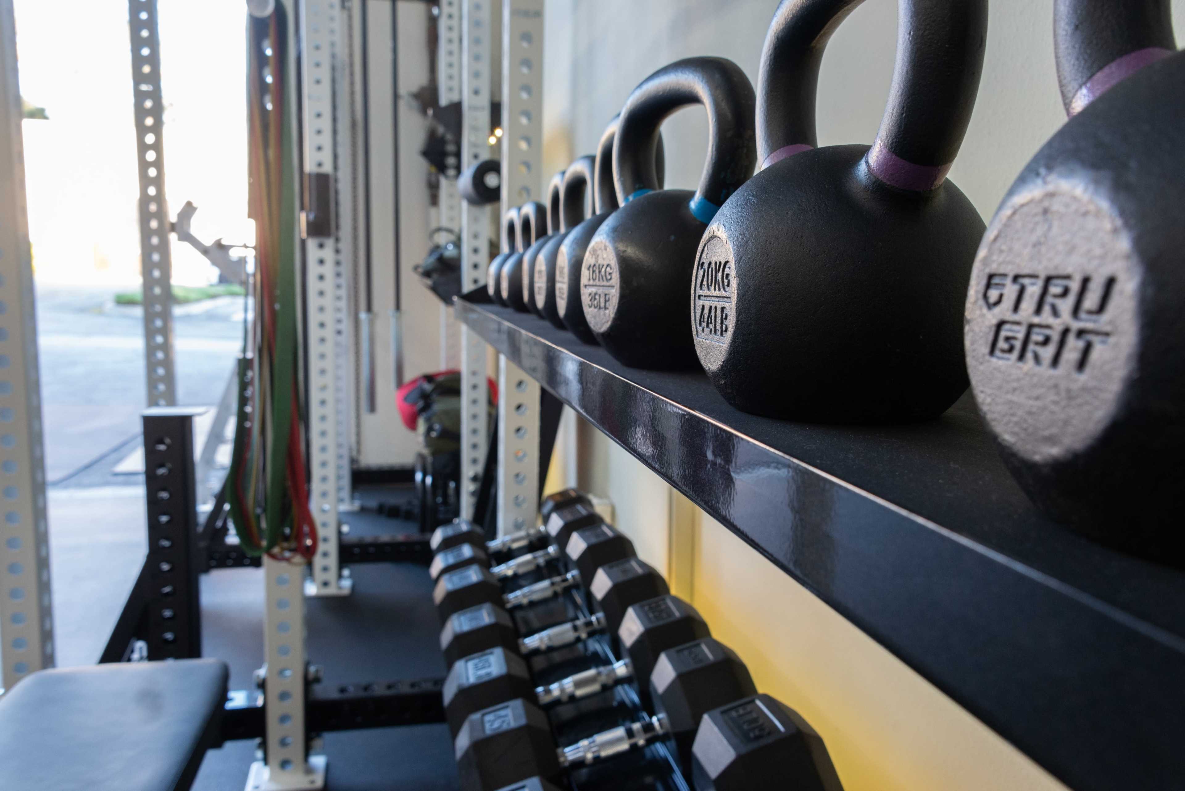 Modern Premium Fitness Studio Gym w/ High Ceiling & Rolling Gate Image in North Central, Pasadena, CA