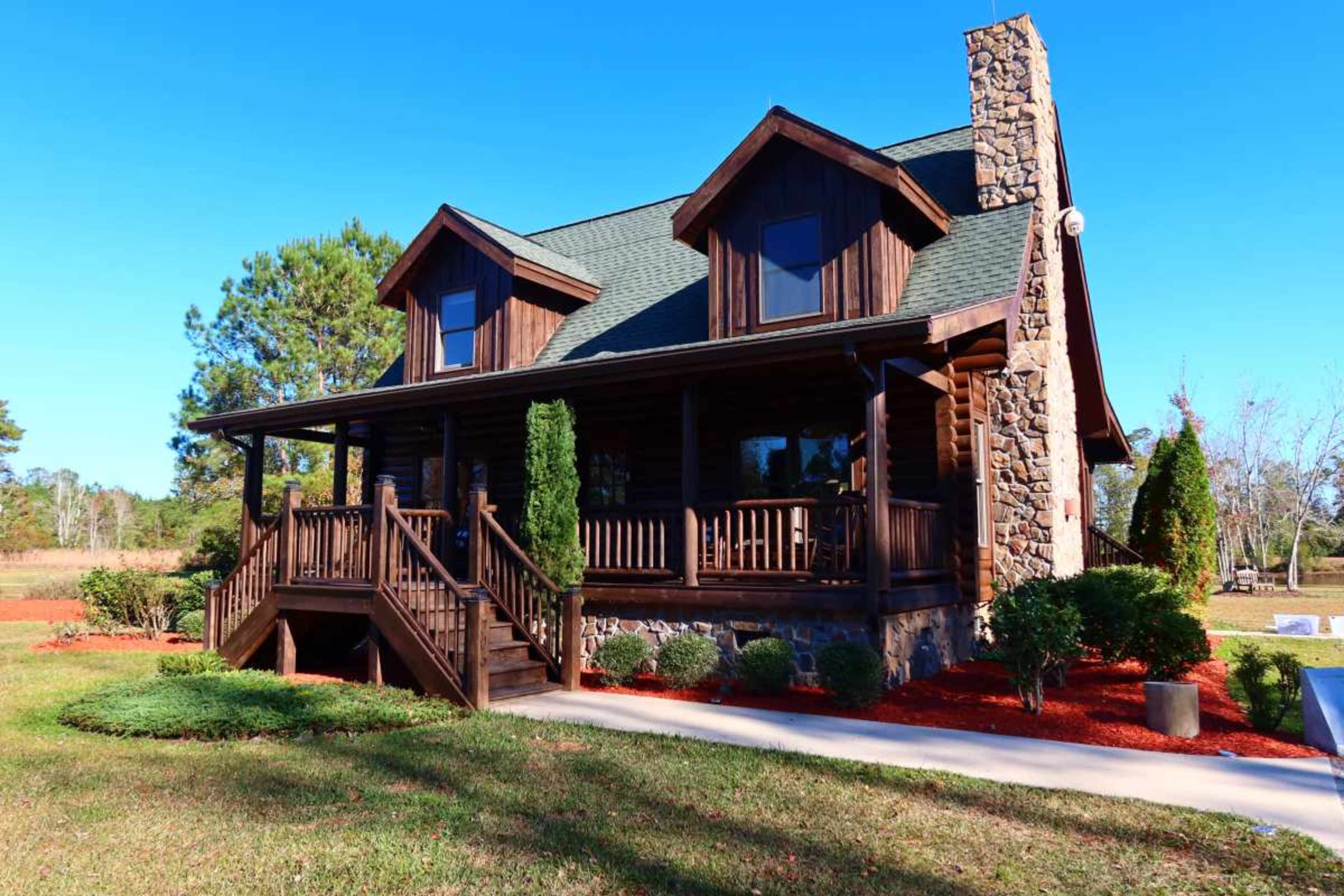 Scenic Wedding & Event Venue with Log Cabins, Ponds, and Rustic Elegance in North Carolina Image in , nakina, NC