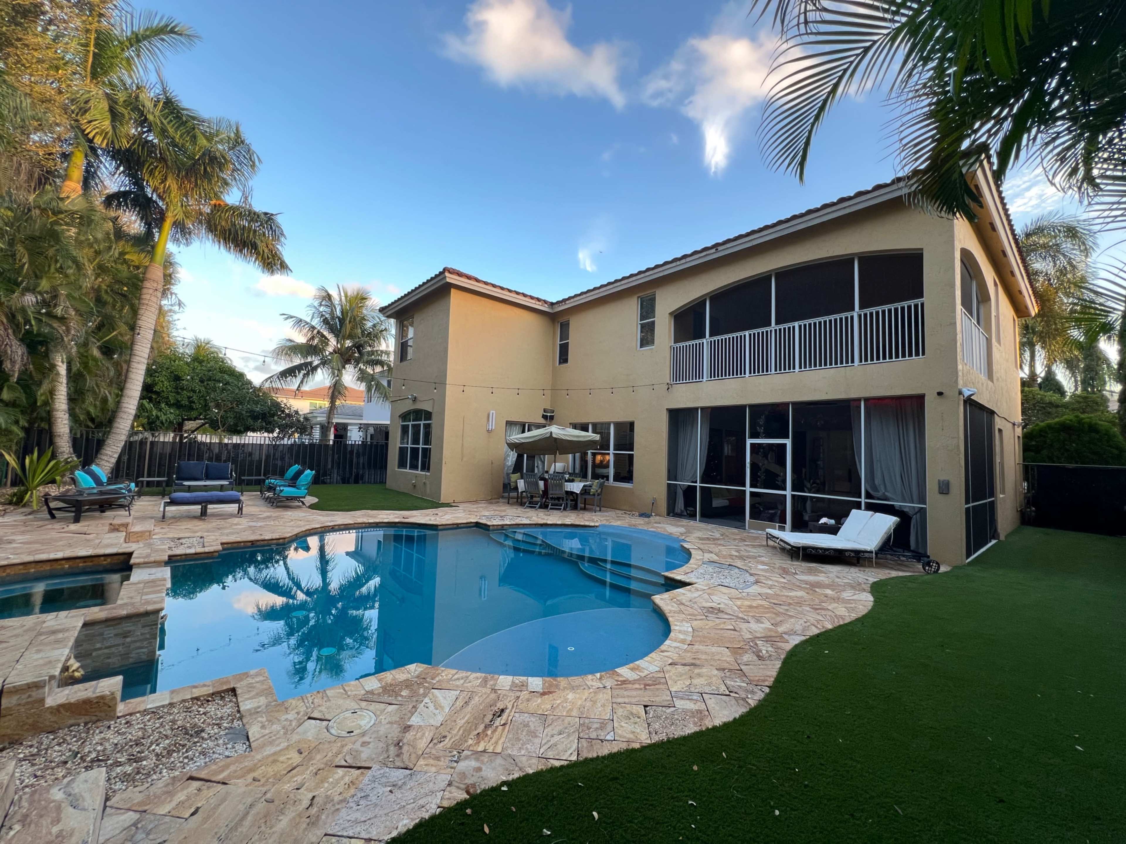Spacious Backyard and Lanai With Pool Image in , Lake Worth, FL