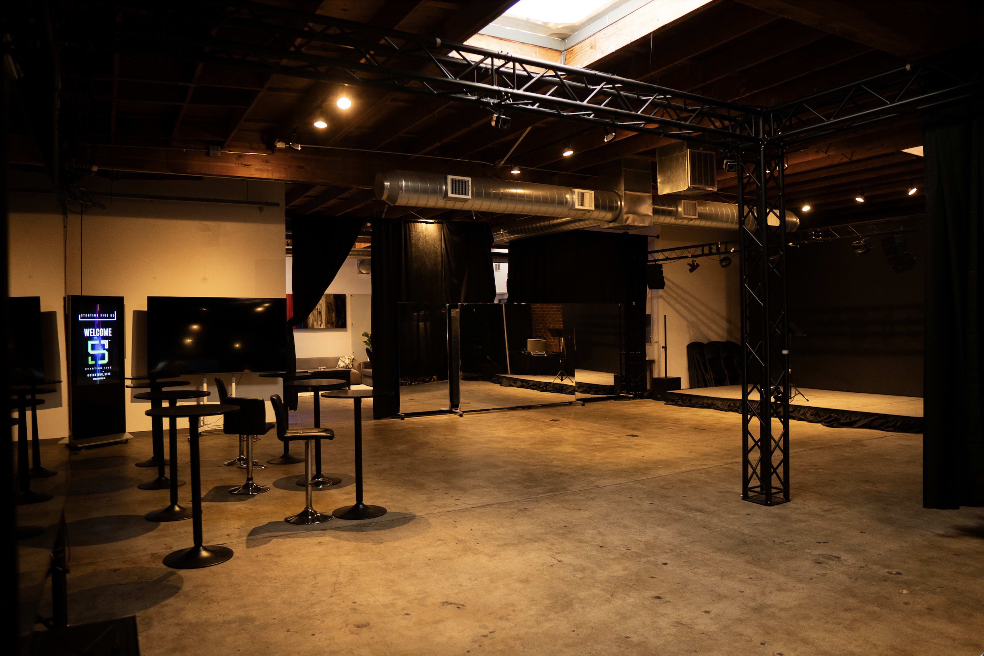 Unique & Spacious Flex Space with Stage | Sound System | Multiple Rooms | Red Carpet | Podcast Studio Image in Mid-City, Santa Monica, CA