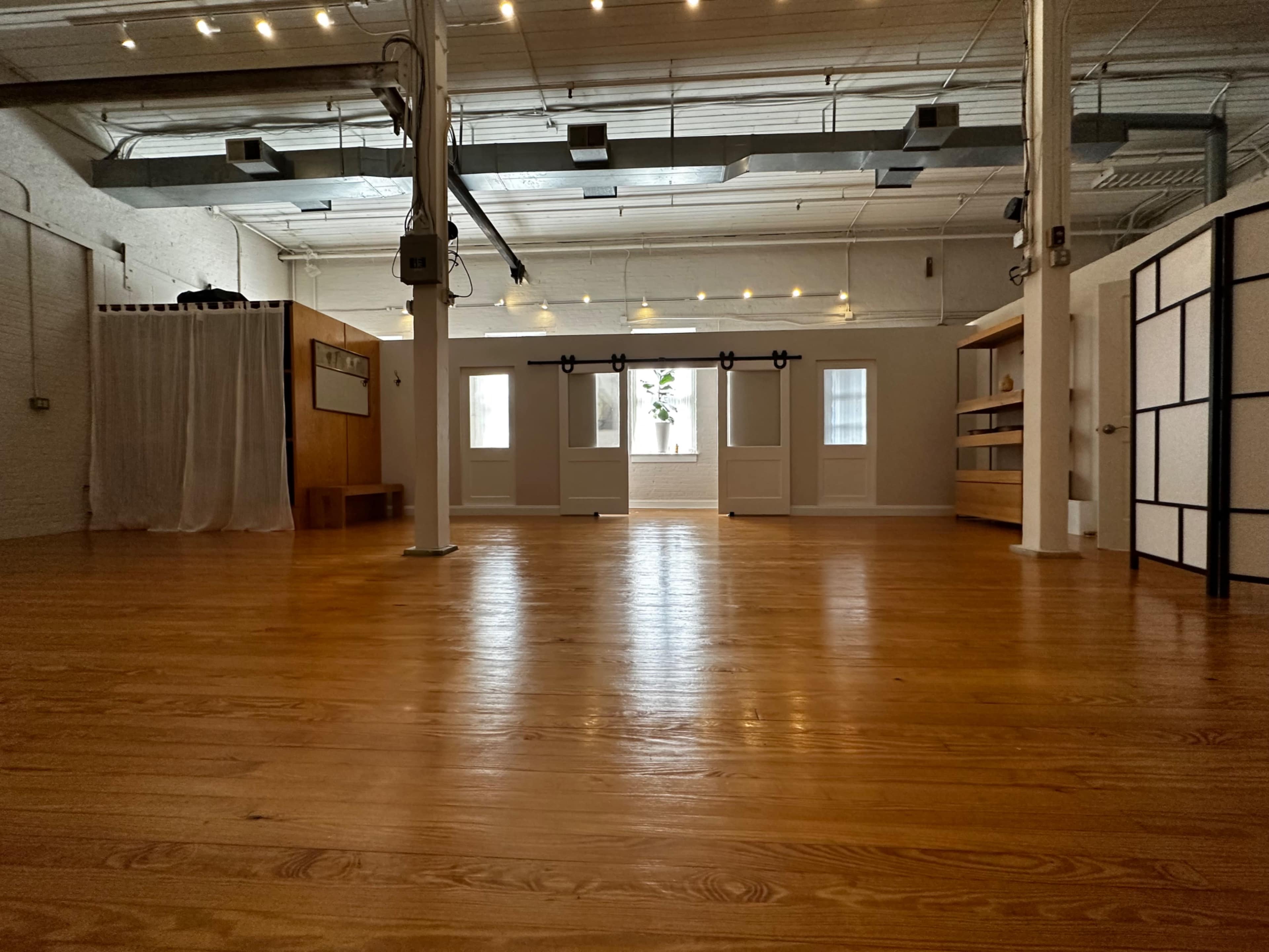 A stunningly warm & light filled industrial space in a novel location. Image in Hampden, Baltimore, MD