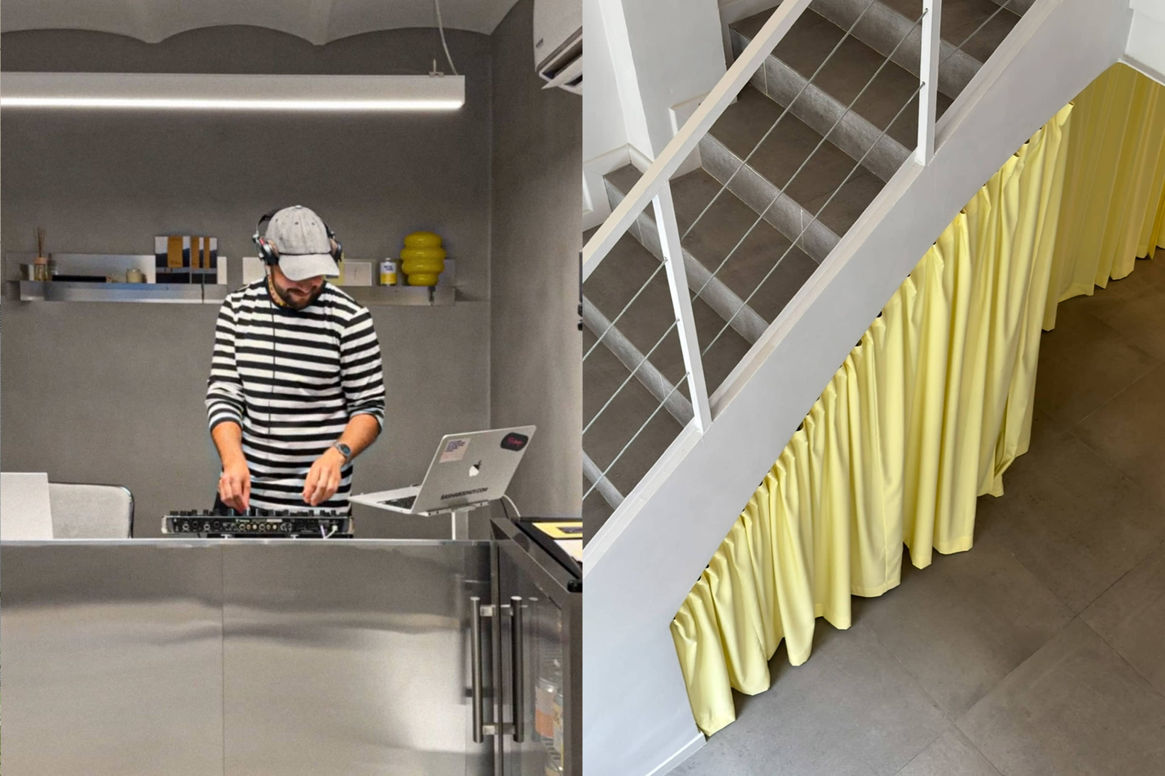 A DJ wearing headphones and a striped shirt operates a turntable in a modern, minimalist space with a gray backdrop, while a view from above shows a staircase with a yellow curtain draping along the side.