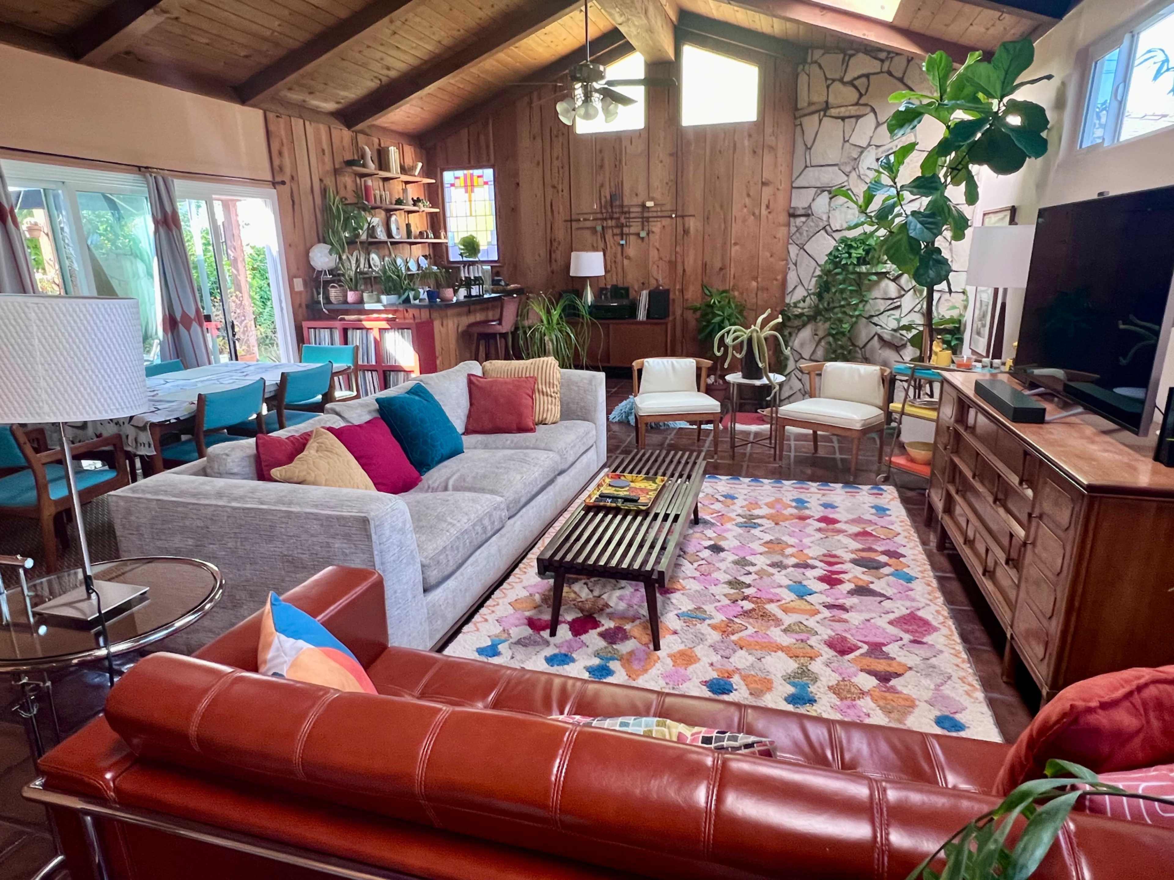 Colorful Midcentury Vaulted Family Room w/Bar, Sunken Fireplace, 50s/60s Decor, Greenery, Natural Light Image in Sunset Park, Santa Monica, CA
