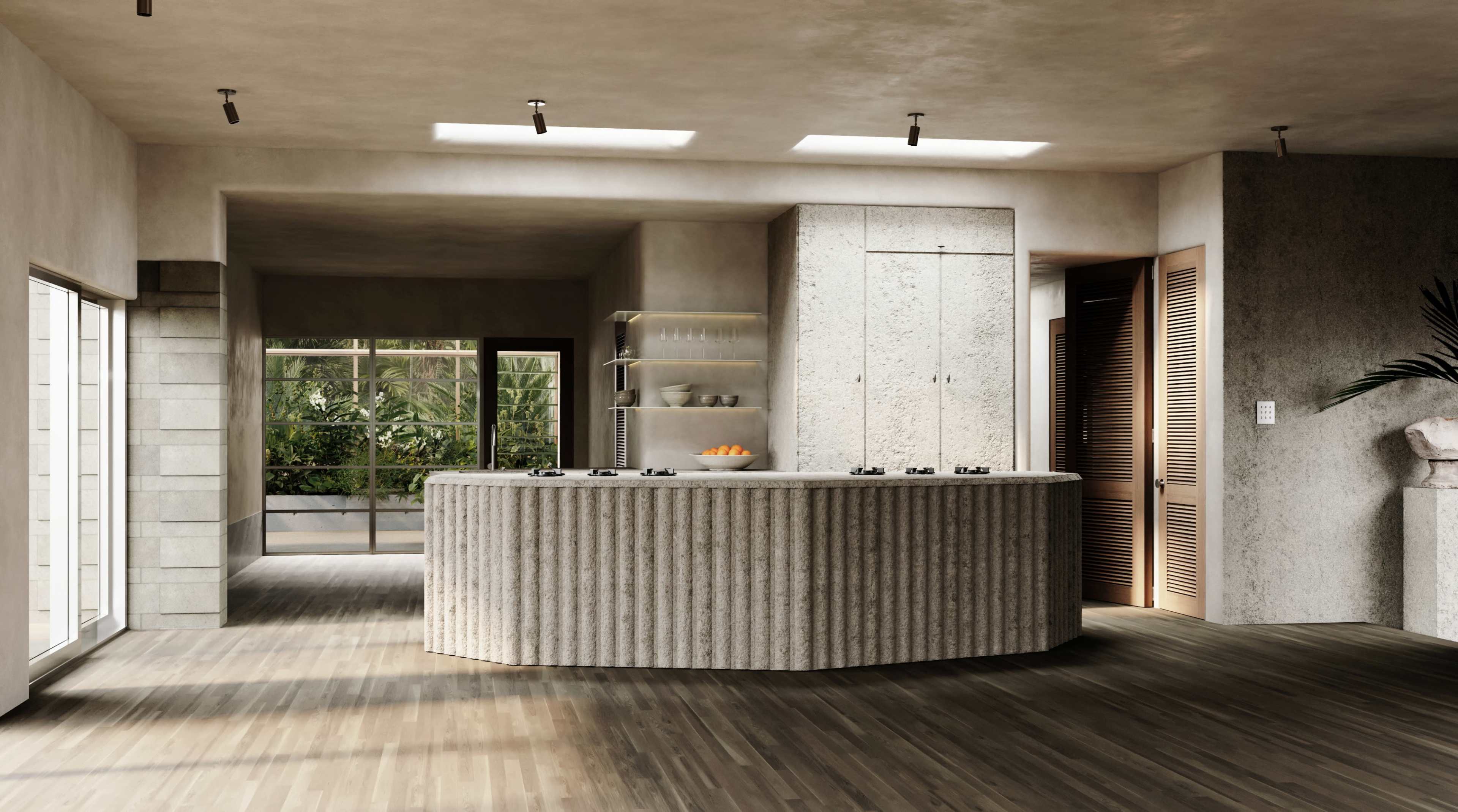 The image shows a modern kitchen with a curved concrete island, large windows, and an open design that leads to a green outdoor space.