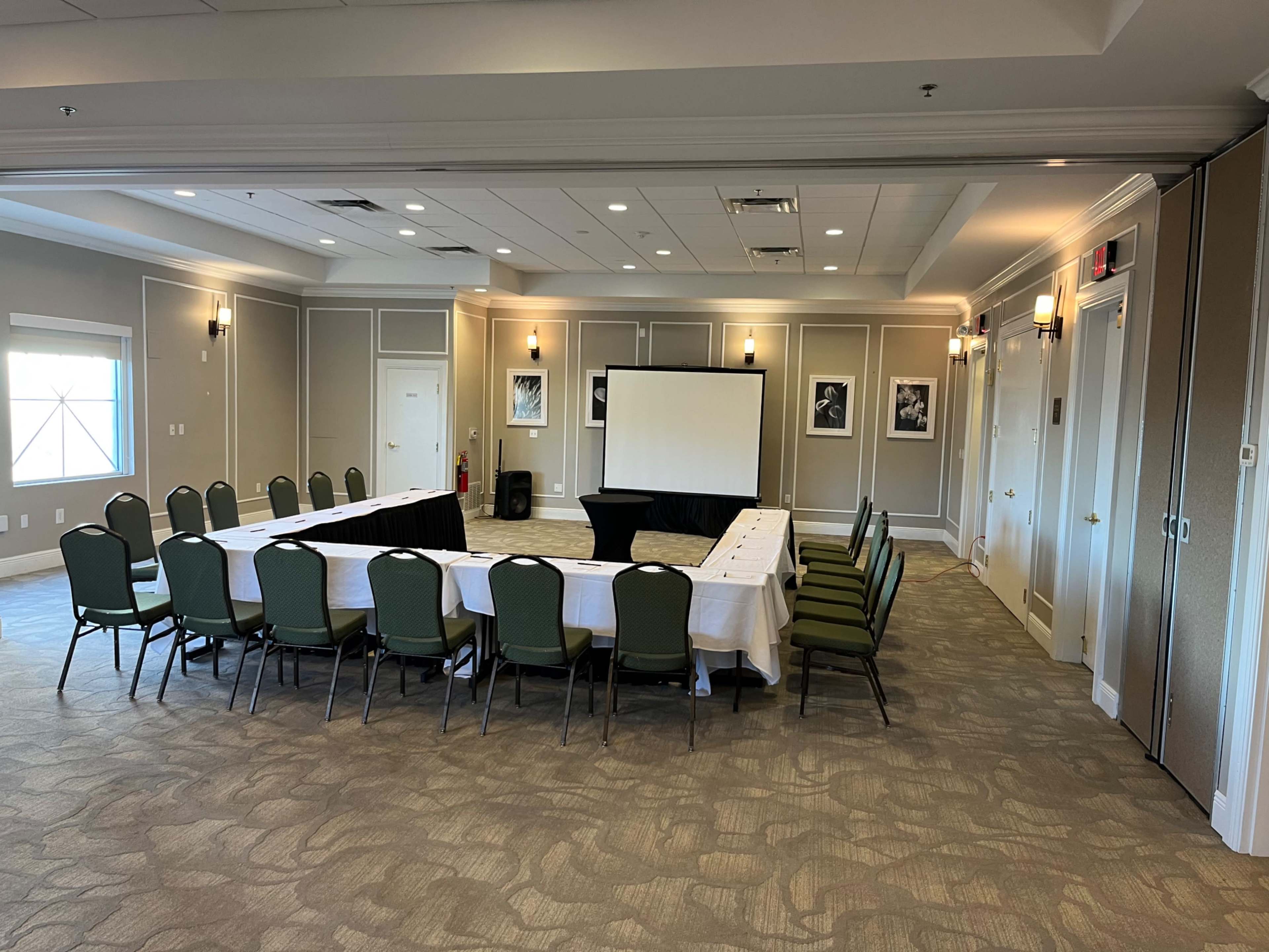Elegant Meeting Room at The Point Hotel & Suites near International Drive Image in Florida Center, Orlando, FL