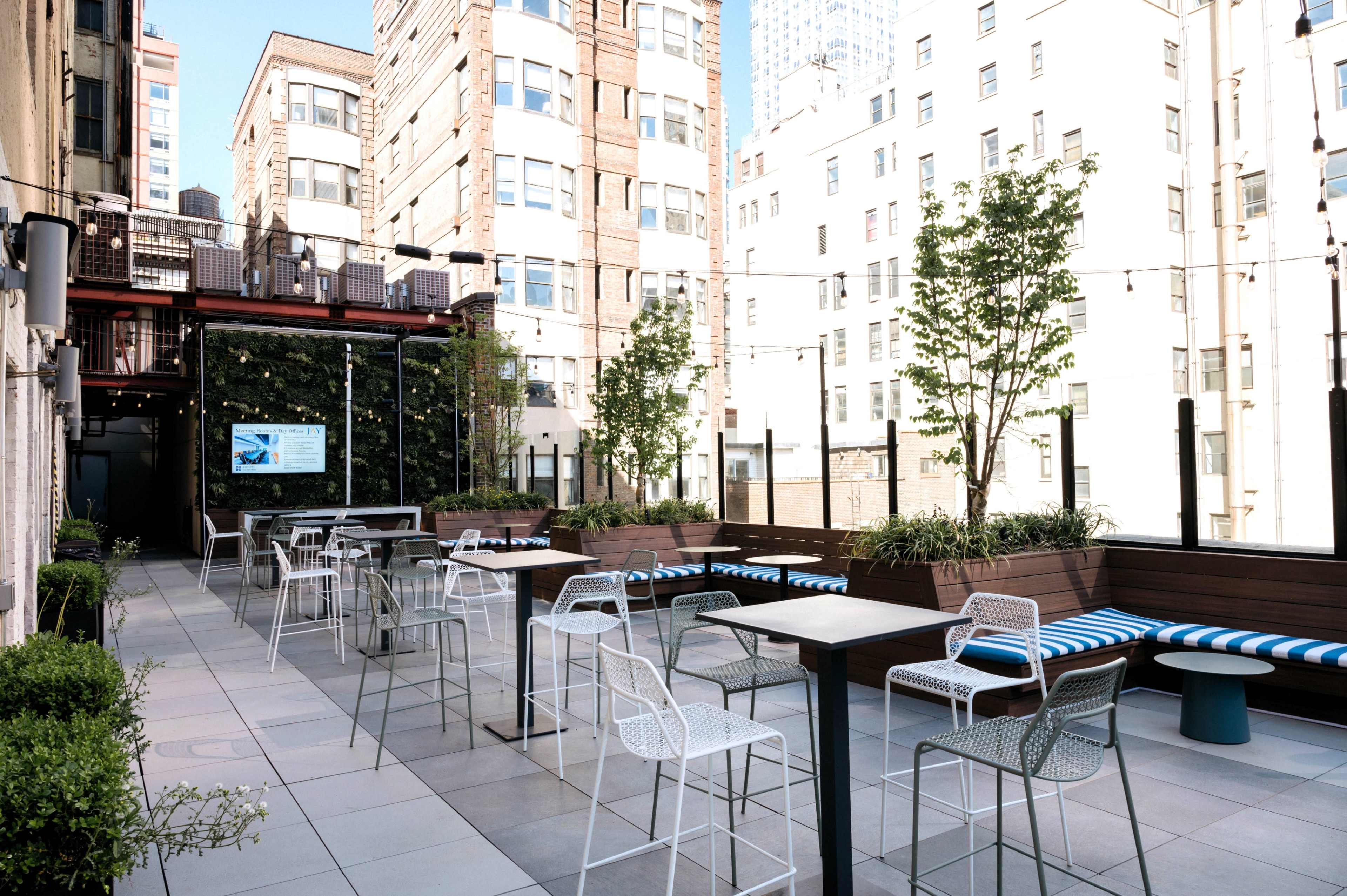 Amazing 2,000 SF Rooftop Terrace in Midtown Overlooking the Empire State Building with Sound System, Seating & Displays - Easy Access from Penn Station Image in Midtown, New York, NY