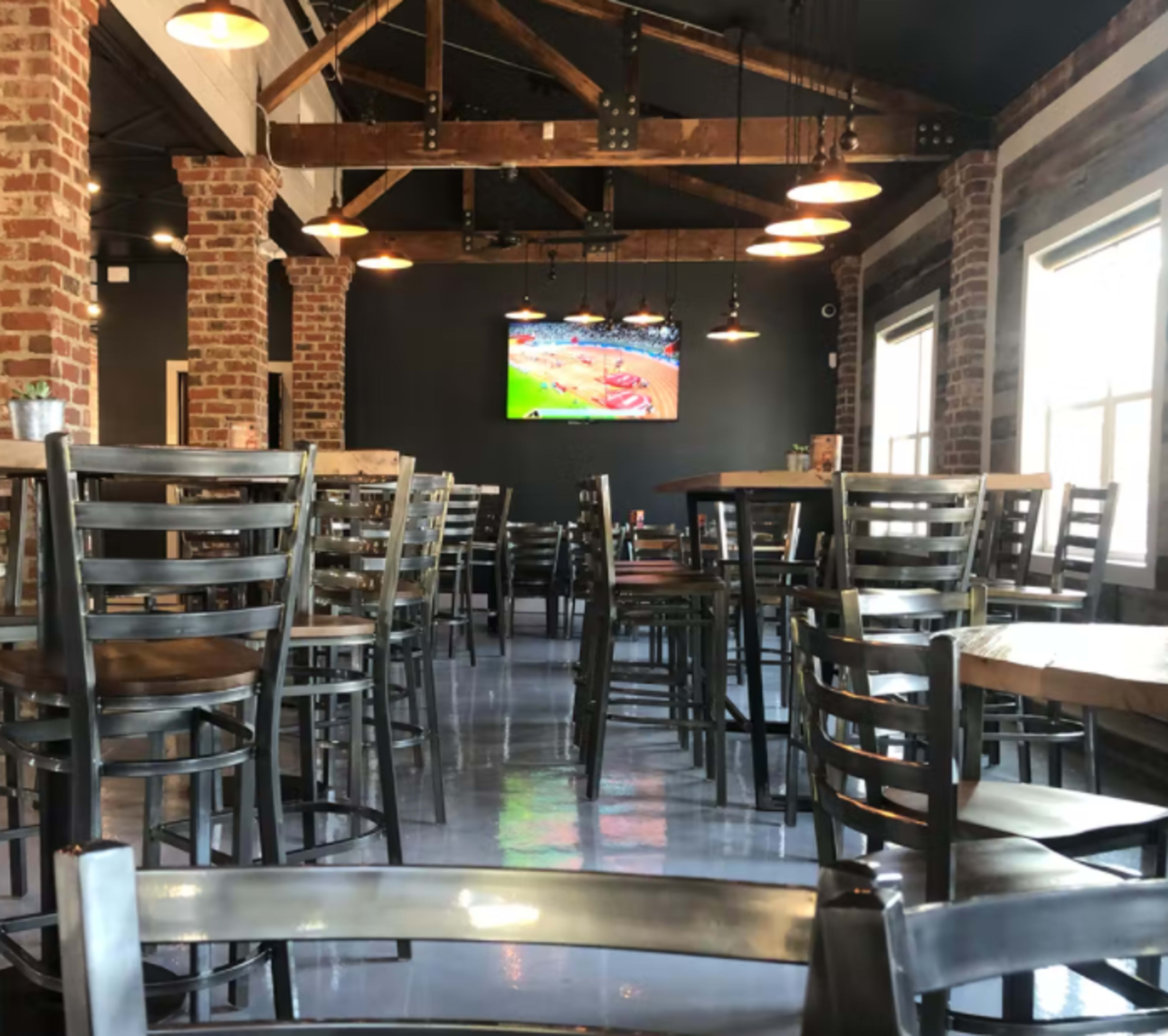 Rustic Brewery and Distillery Venue with Spacious Outdoor Patio, Half an acre of Grassy Area, and Ample Parking Image in Wake Forest, Wake Forest, NC
