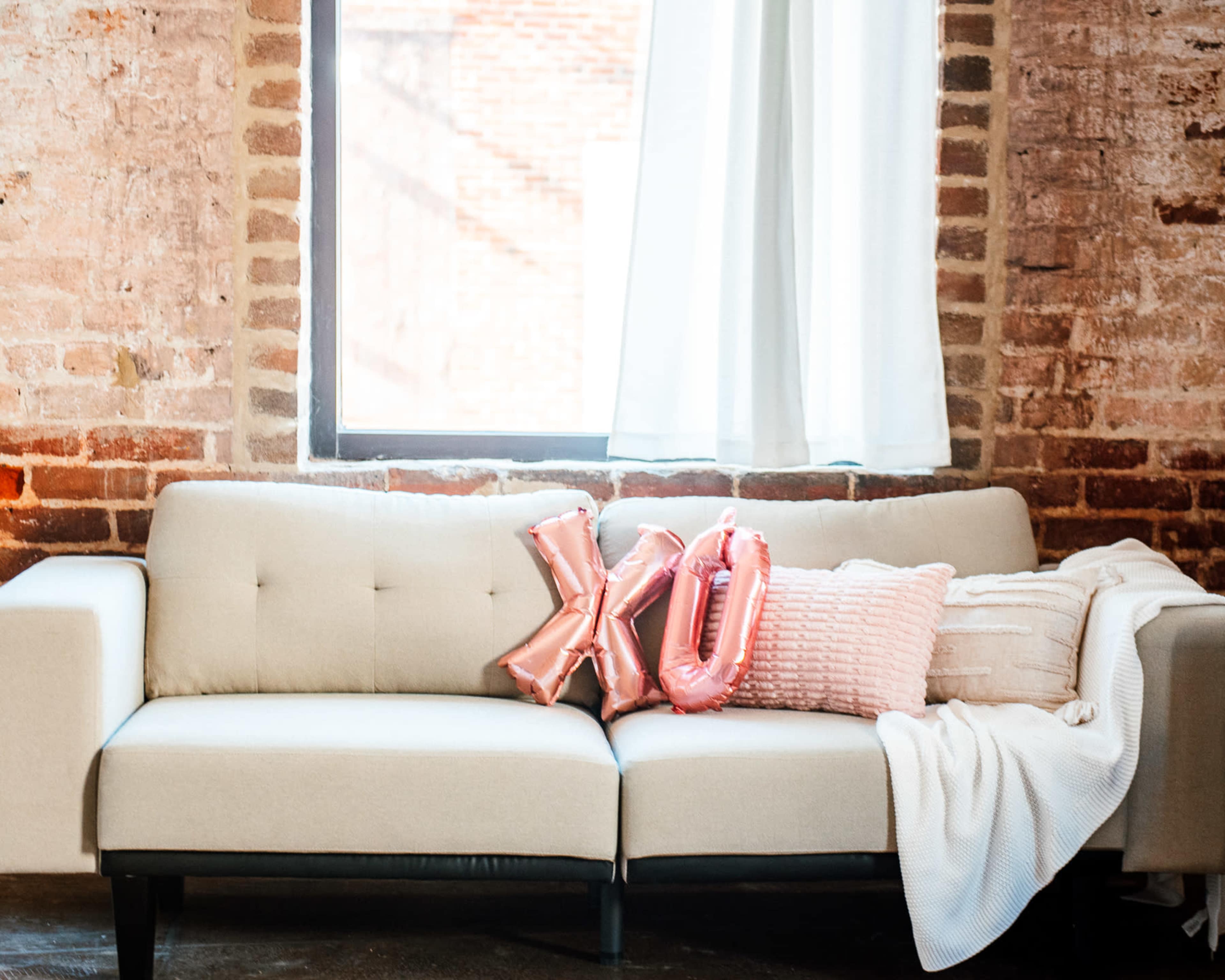 Downtown Photography Studio with Exposed Brick and Natural Light Image in Gibsonville, Gibsonville, NC