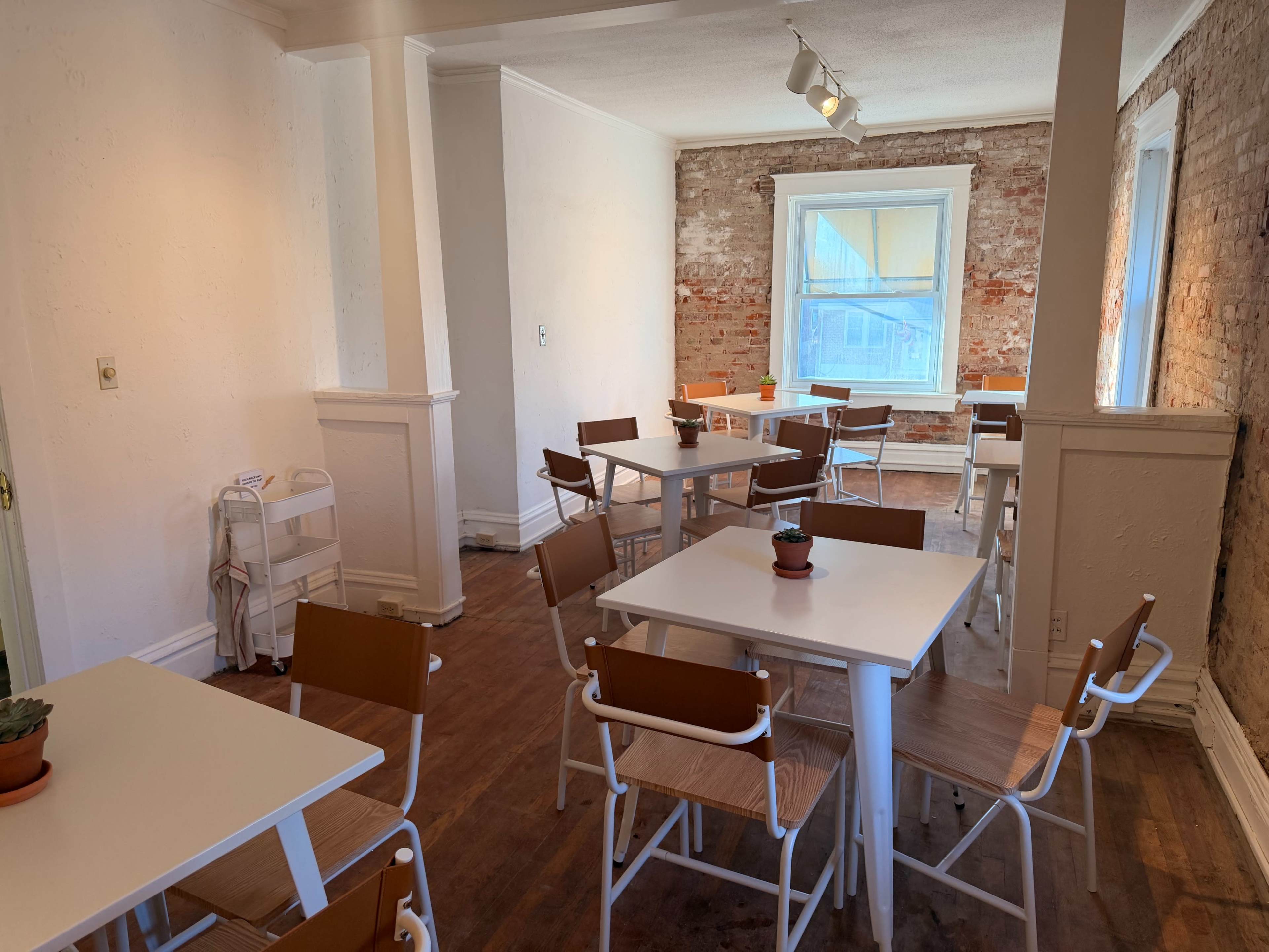 Cozy Upstairs Meeting Space with Lunch Options Downstairs Image in Hadley Township, Maplewood, MO