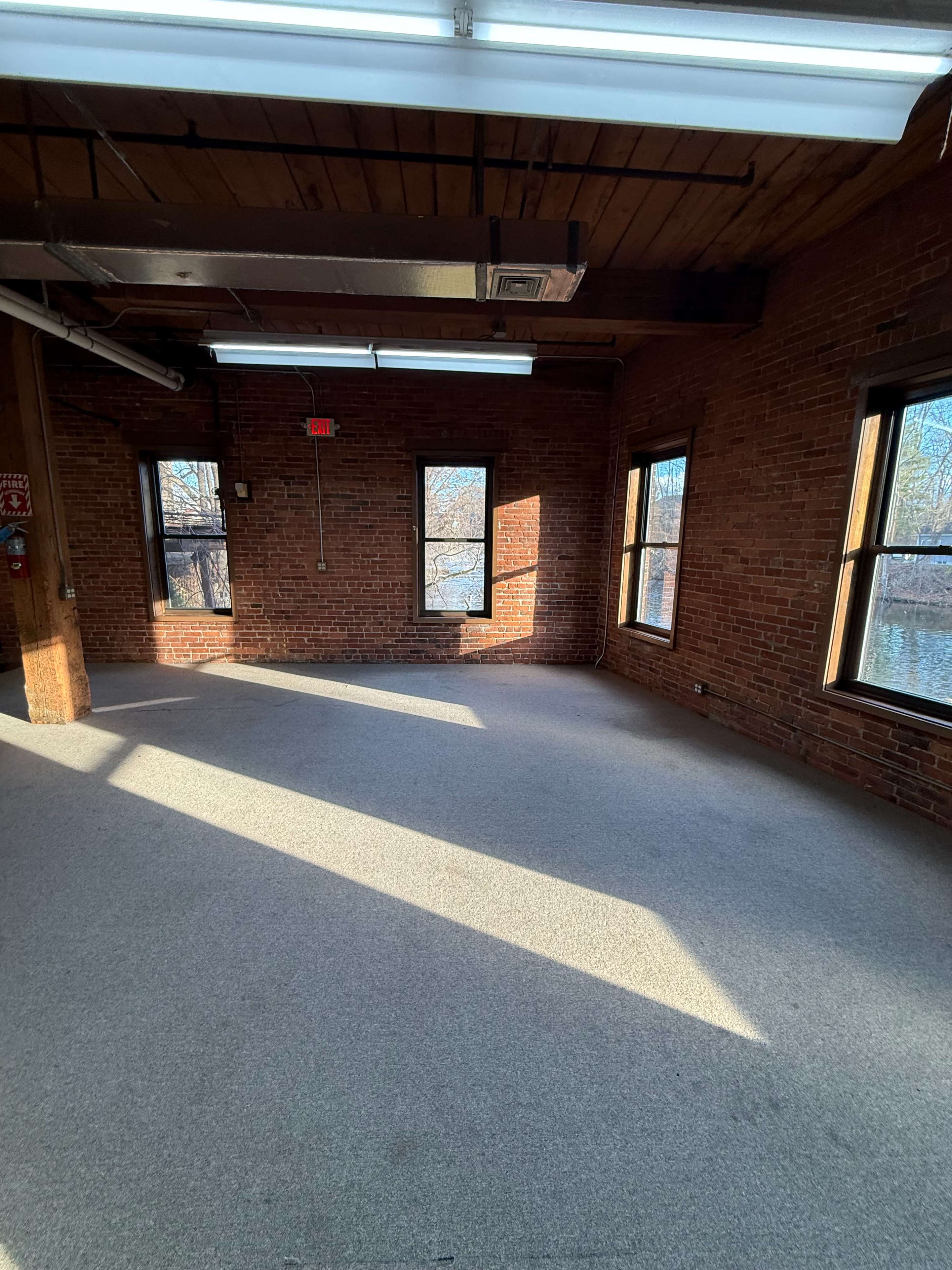Historic Brick & Beam Loft with Waterfall and River Views Image in East Hartford, East Hartford, CT