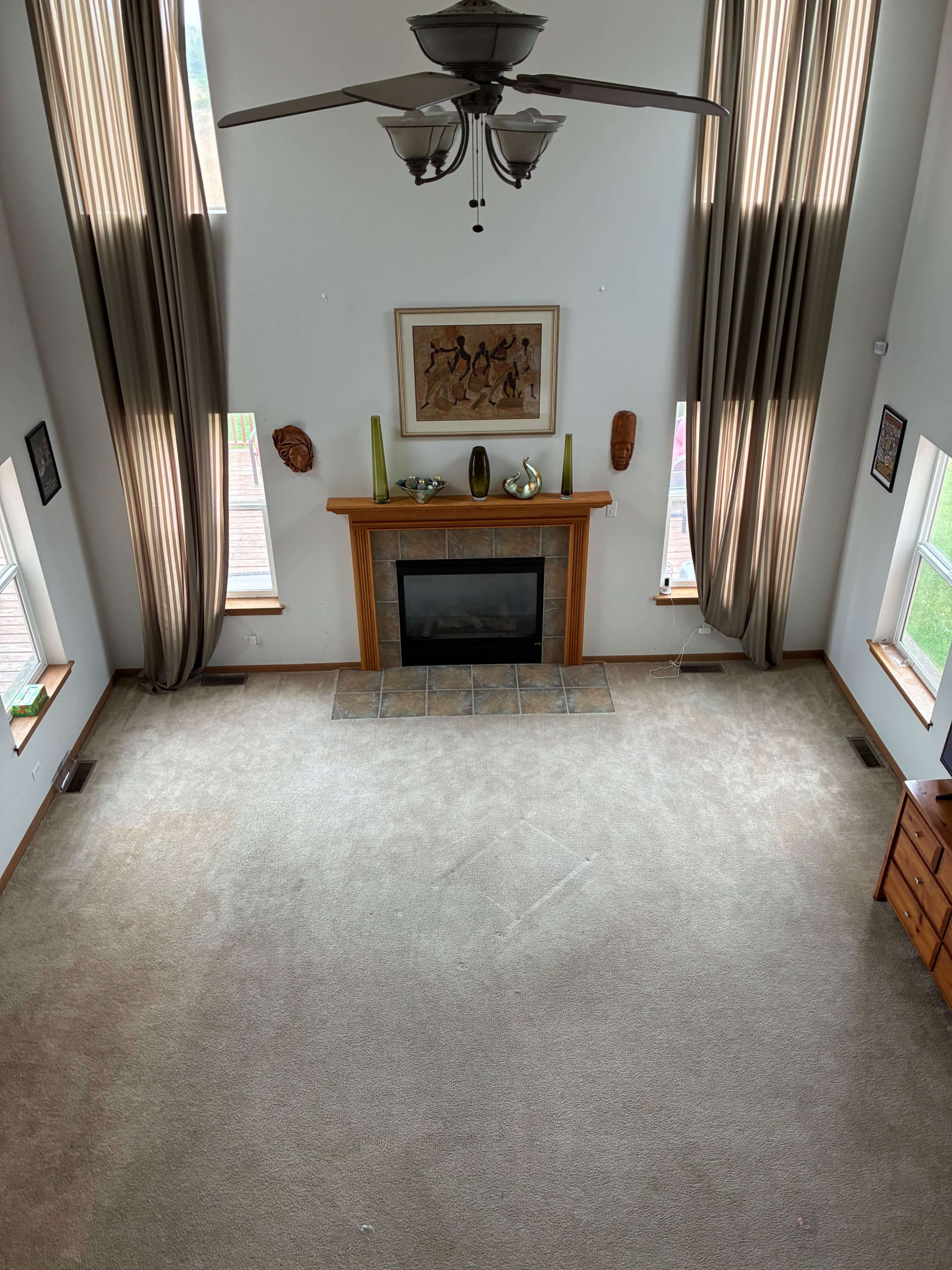 suburban open concept great-room and deck with beautiful forest preserve view Image in Thornton Township, South Holland, IL