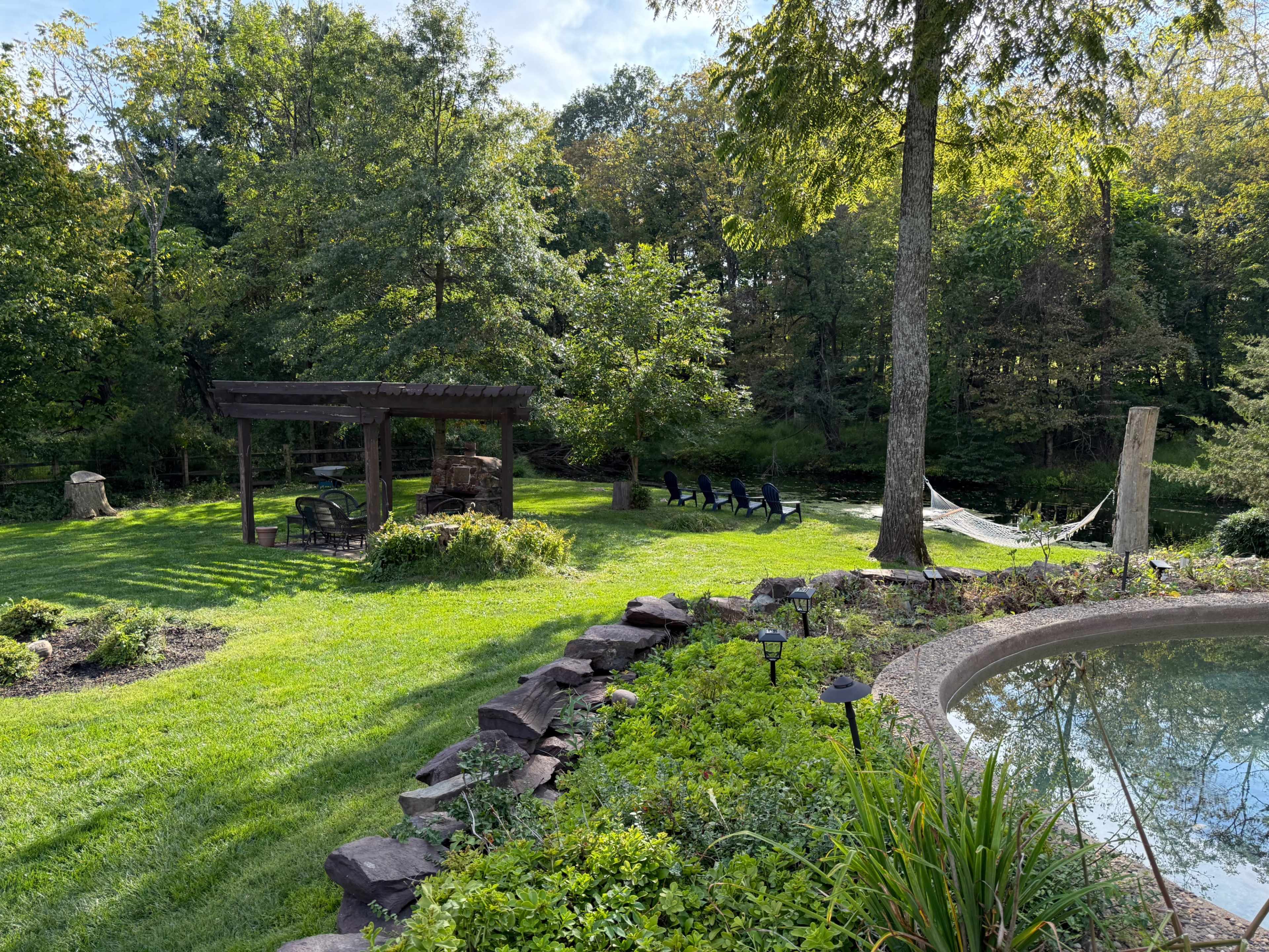 Dreamy Backyard with Pool and Water Views Image in Wycombe, Furlong, PA