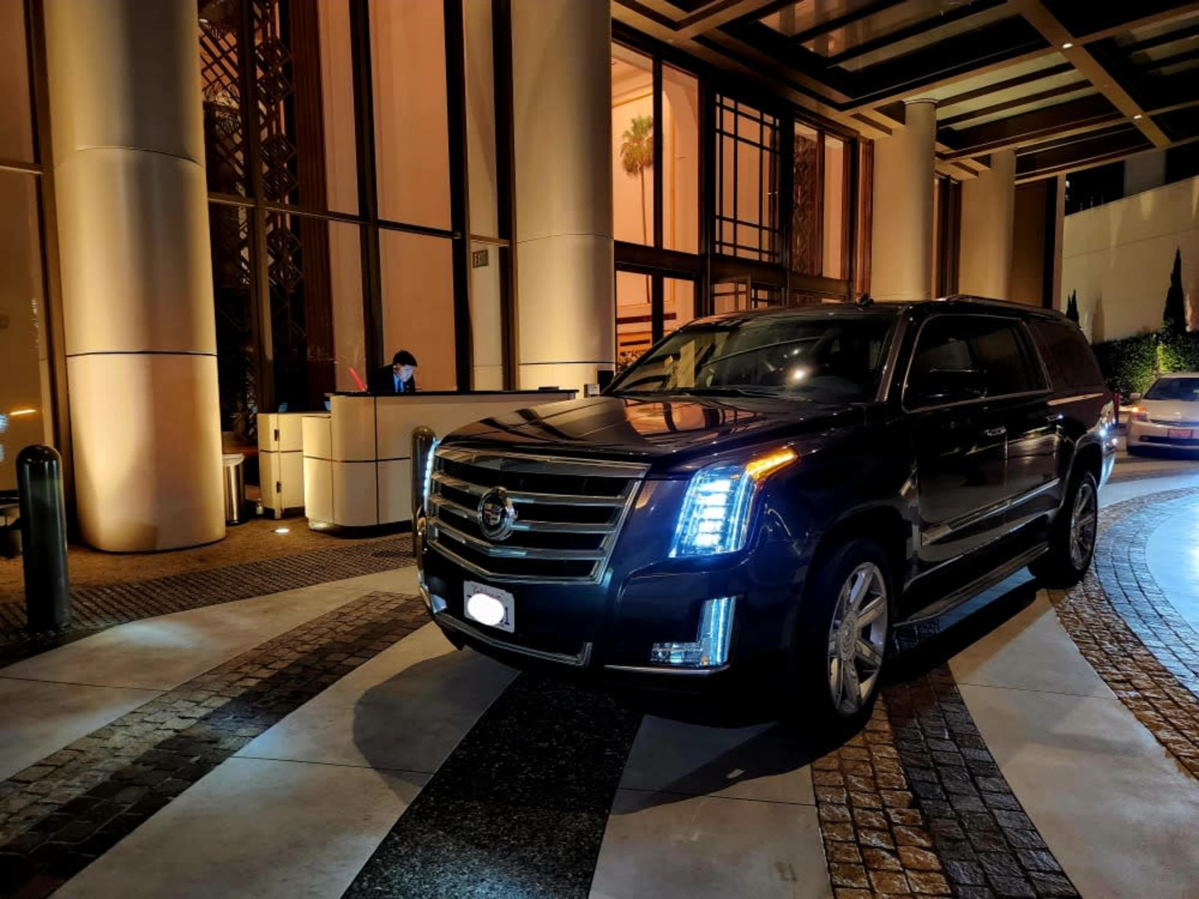 Cadillac Escalade with driver