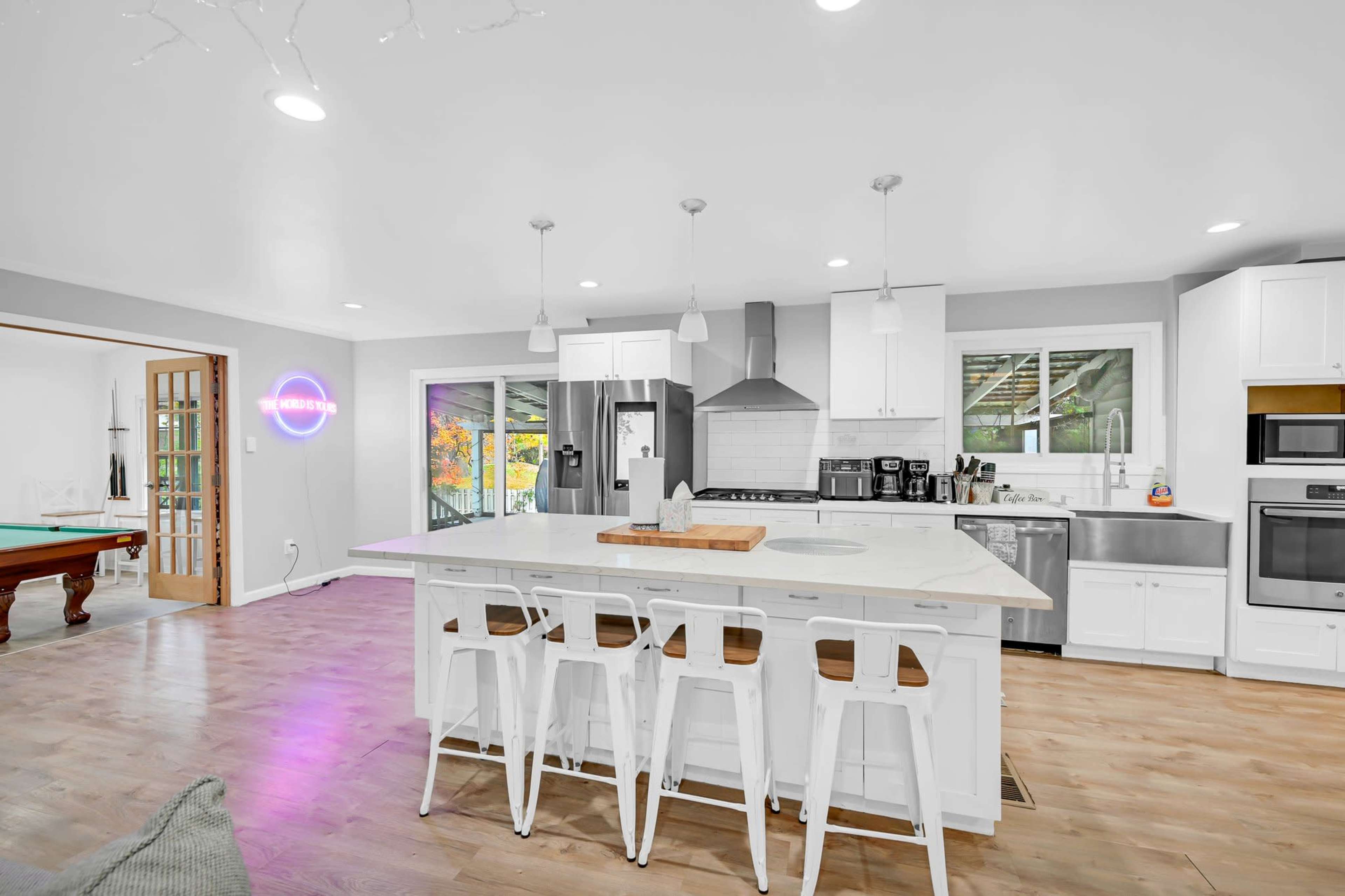 Modern Open Concept Entire single family home with basketball court, trampoline and full deck in the back yard. Small creek runs as well on side of property. Image in Englewood, Englewood, NJ