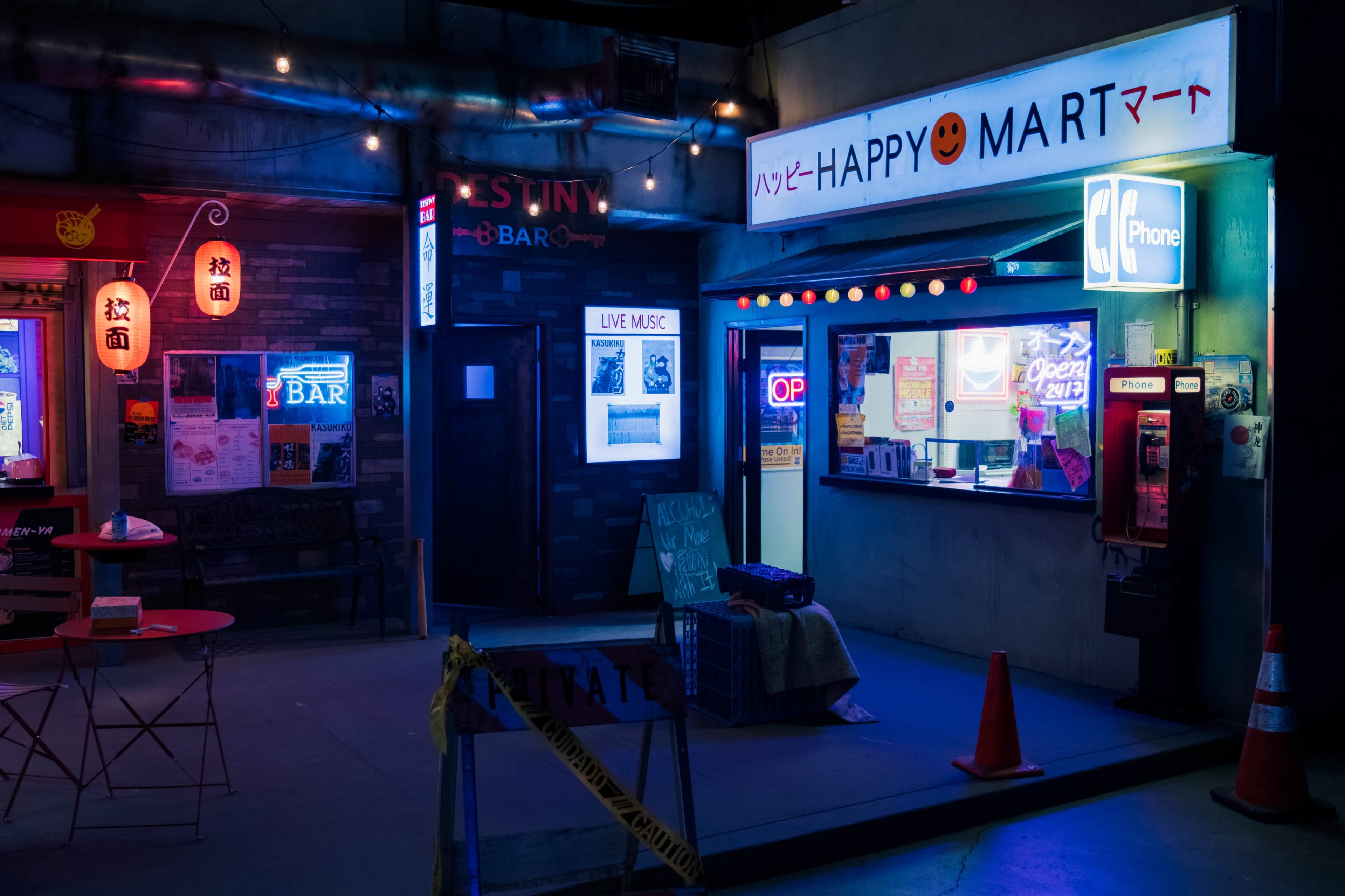 The scene features a brightly lit street corner with a store named "HAPPY MART" and a bar, surrounded by colorful neon signs and a few construction cones.
