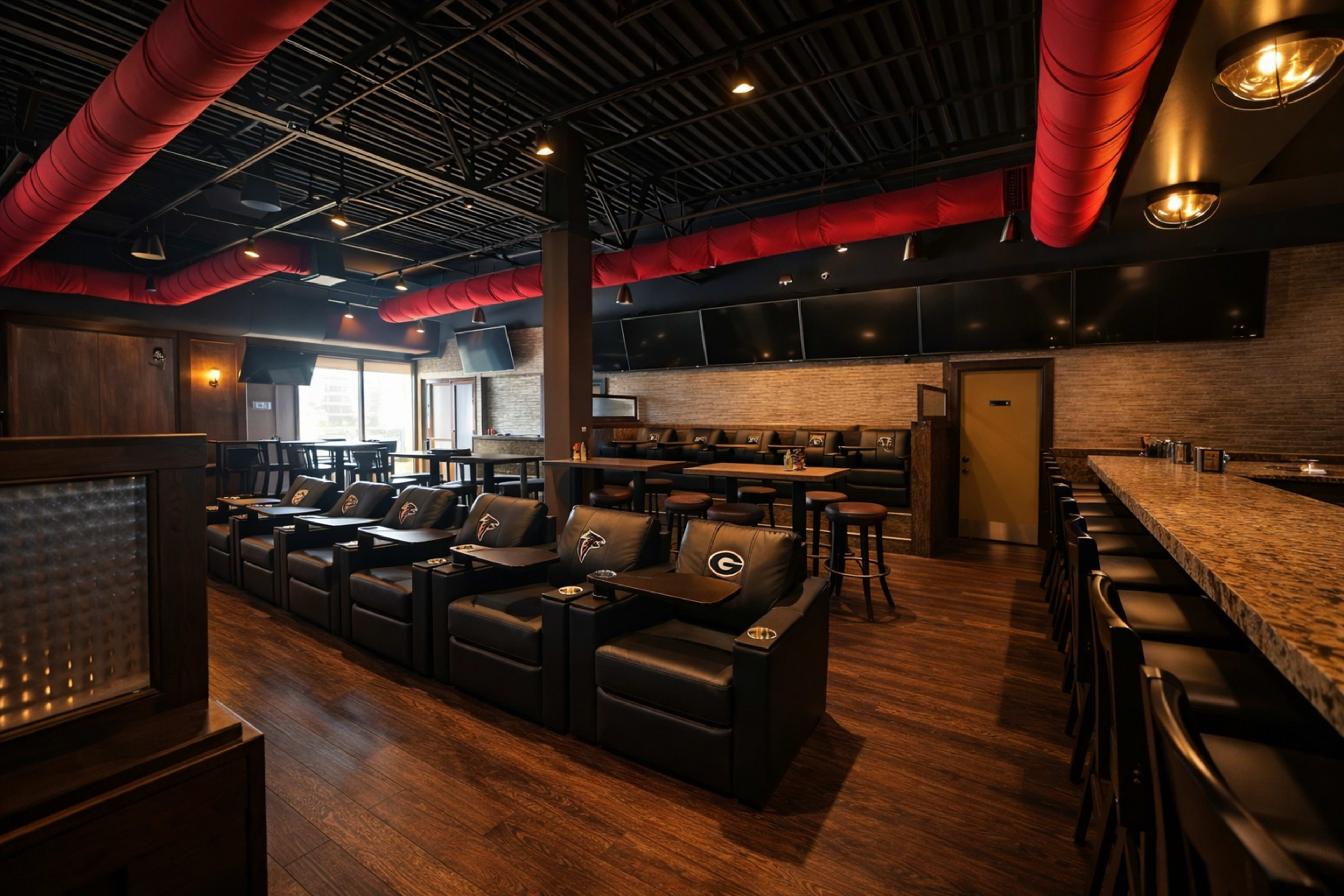 The image shows a modern bar interior with leather seating, wooden flooring, and several television screens mounted on the walls.