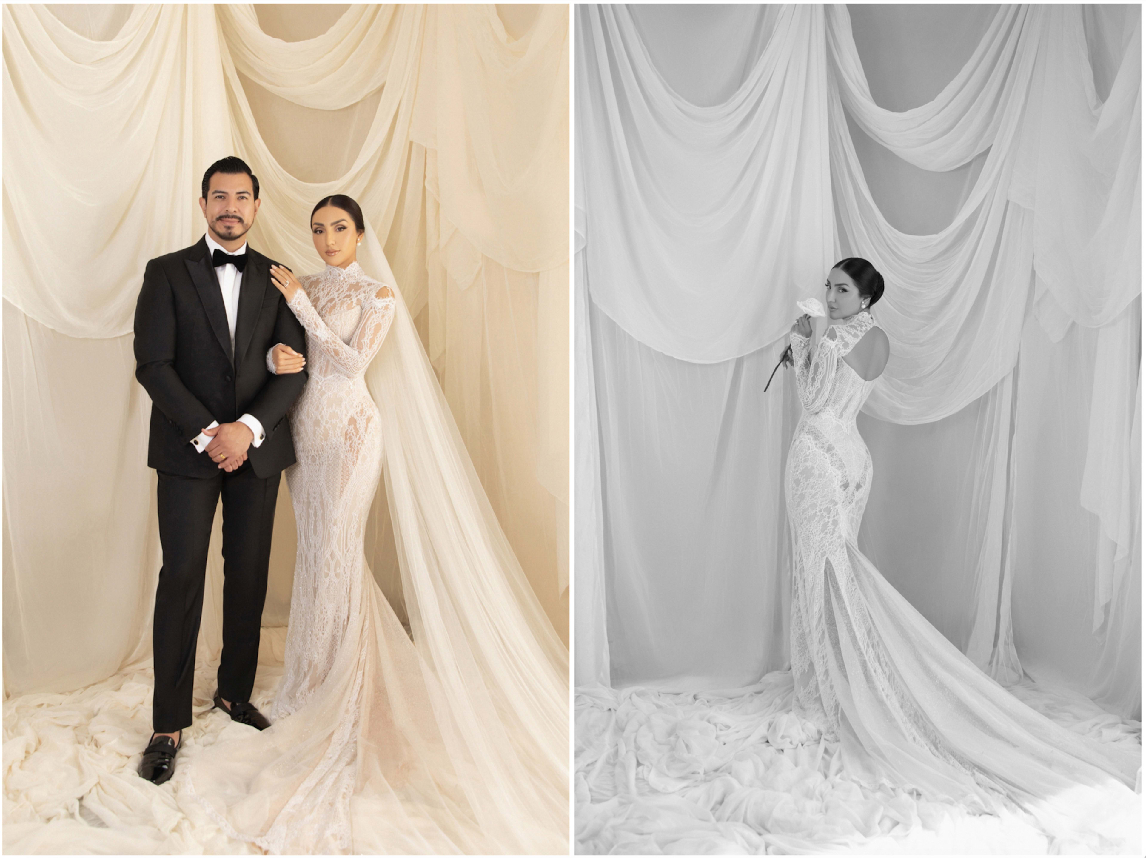 A couple poses together in formal attire against a backdrop of draped fabric, with the woman wearing a fitted lace gown.