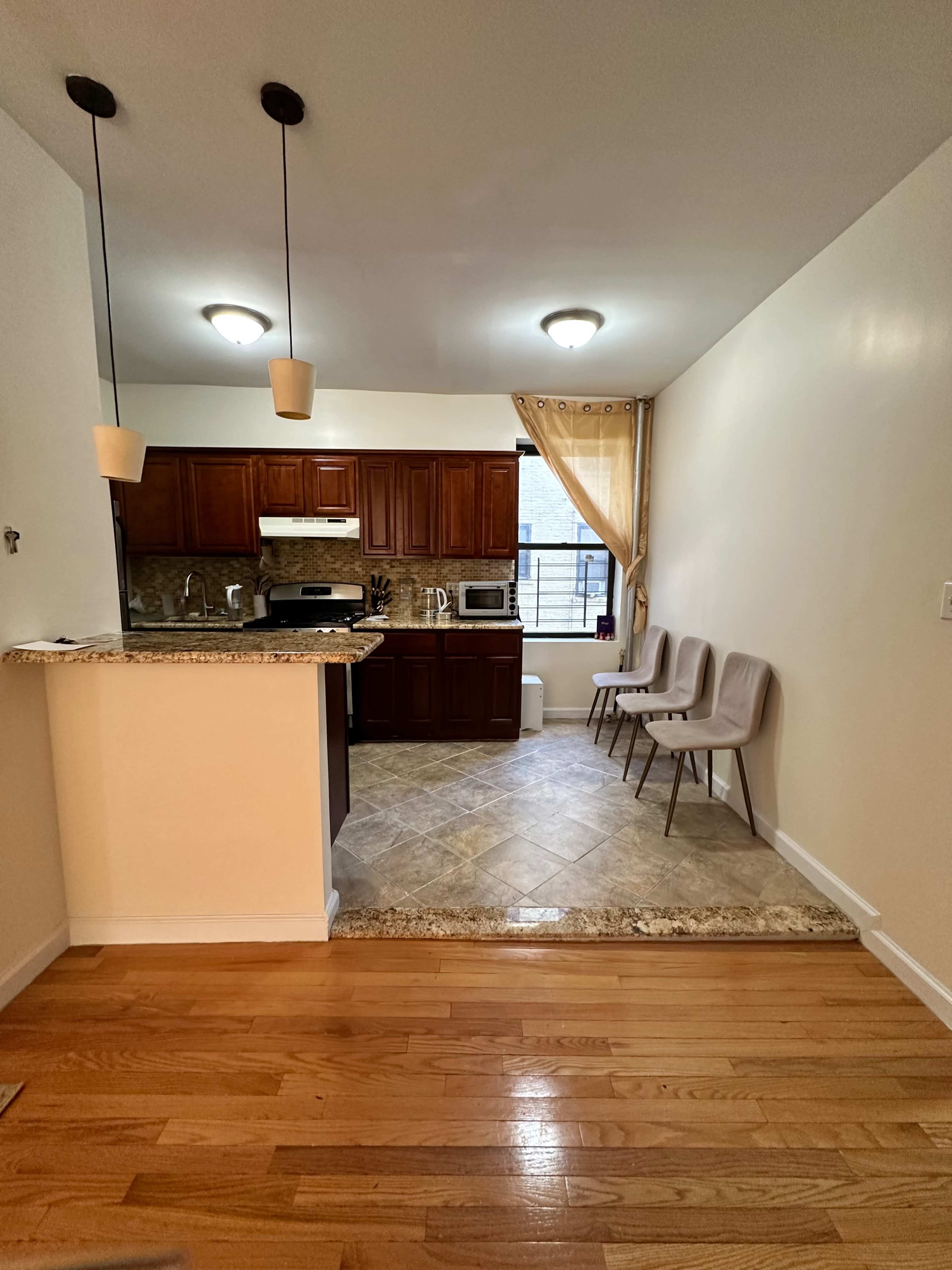 Spacious rooms w/Natural light & movable furniture Image in Washington Heights, New York, NY