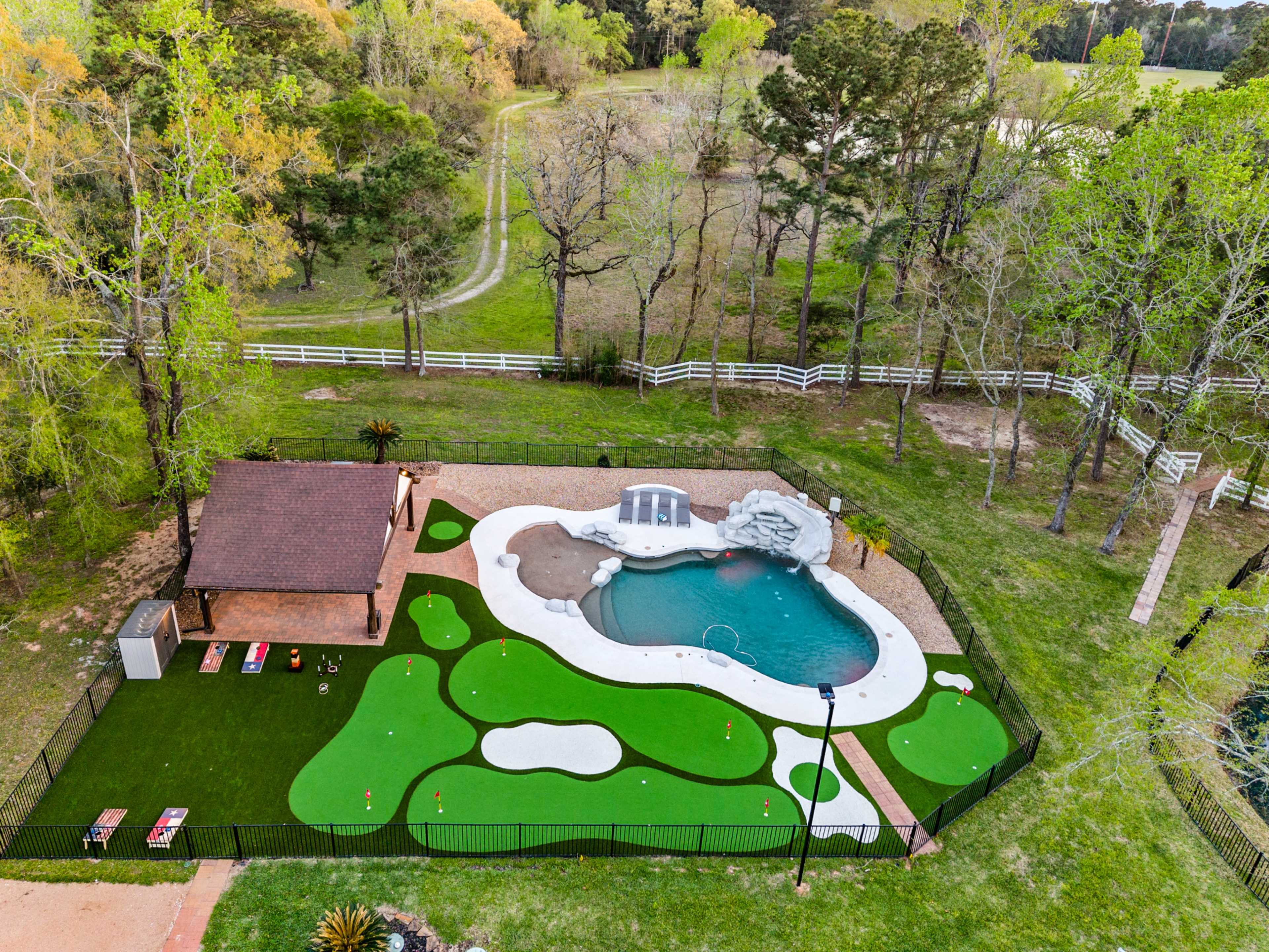 The LUX at West Lane Event & Stay Villa, Indoor & Outdoor Entertainment, Bar, Pool, Golf, Pickle & Basketball courts,  fire pit and much more Image in , Magnolia, TX