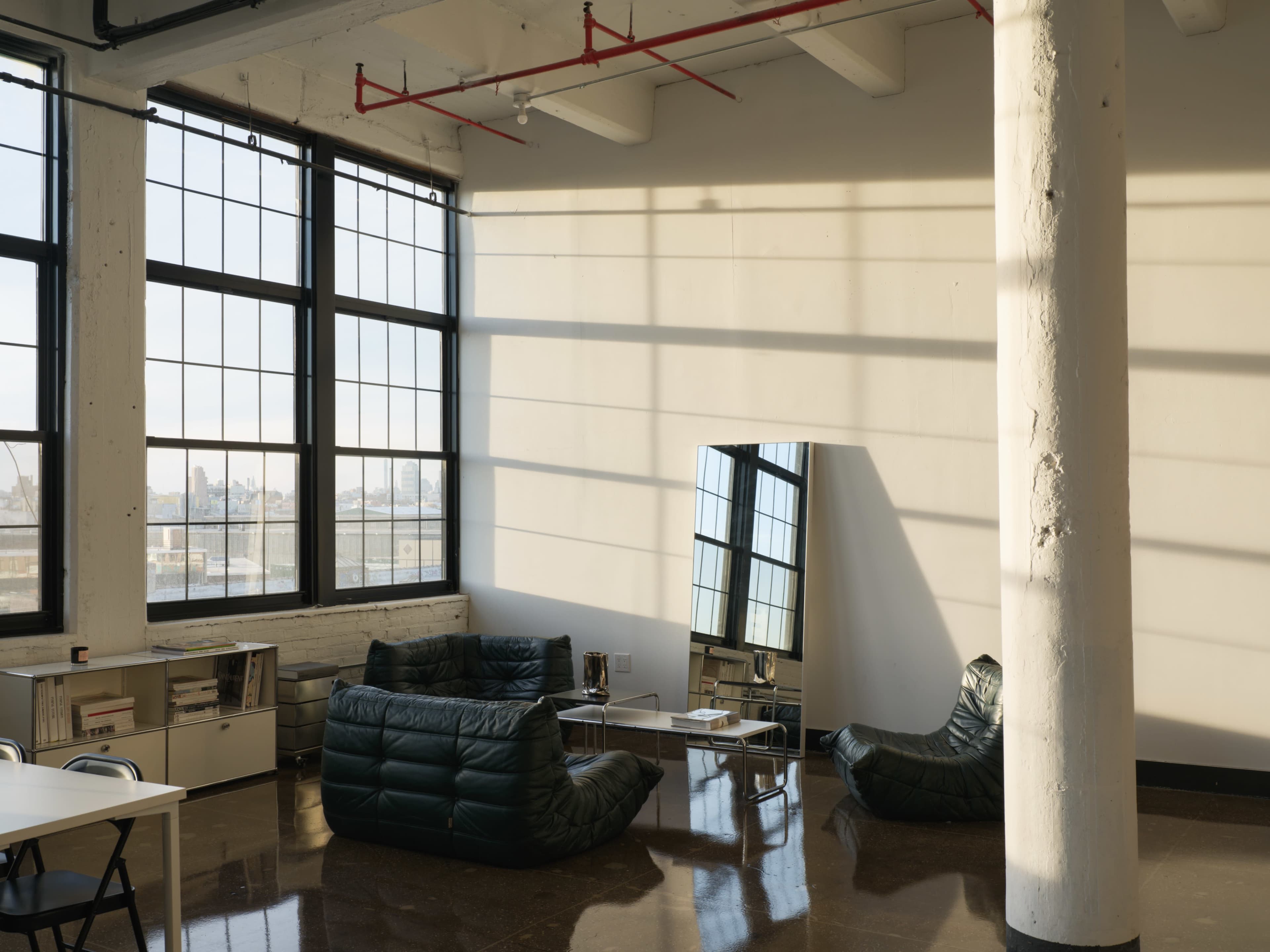 Bright Studio With Cyc Wall And Designer Furniture Image in Bushwick, Brooklyn, NY