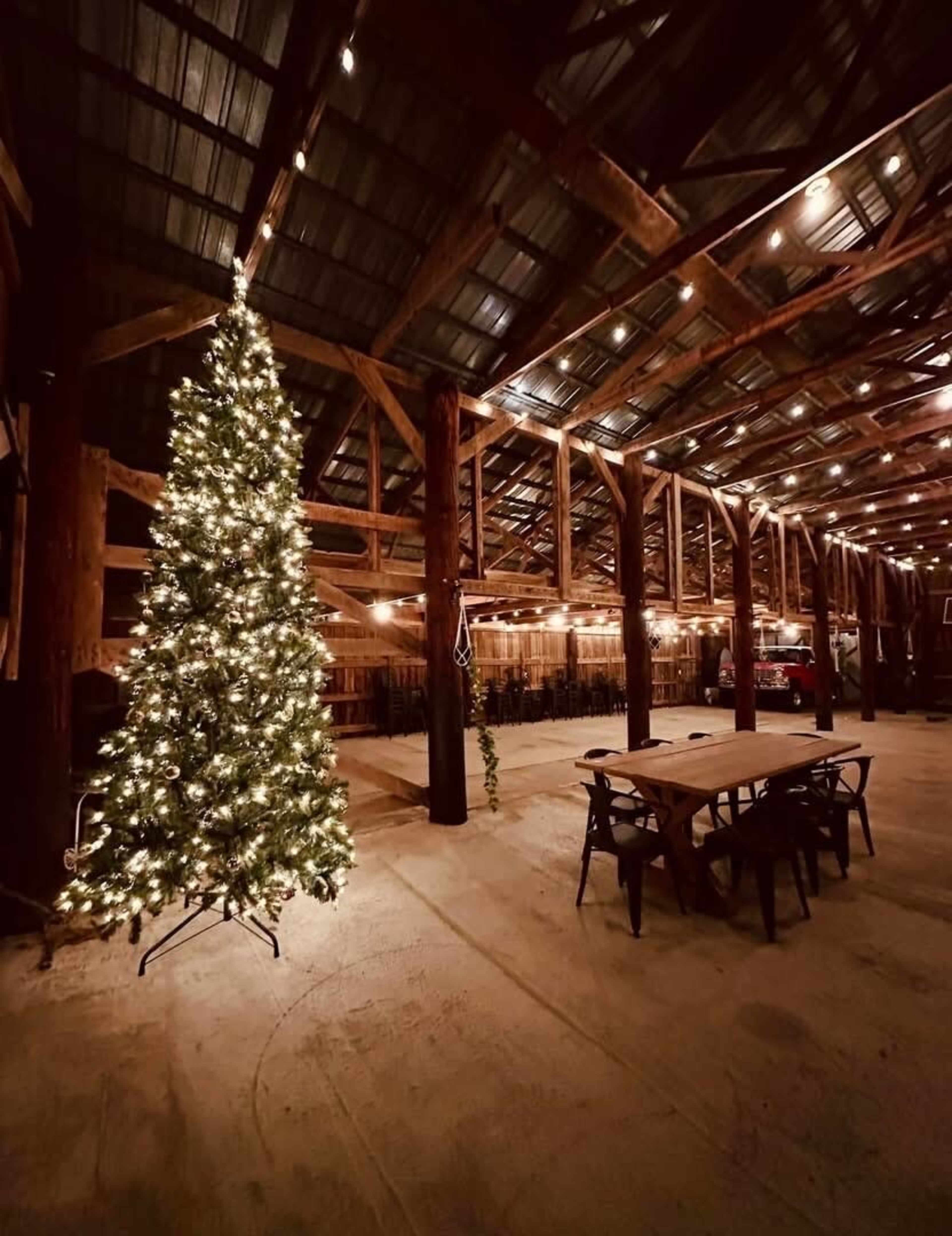 Rustic Barn Venue with Scenic Pond, String Lights, and Cozy On-Site Lodging Image in , Gallatin, TN