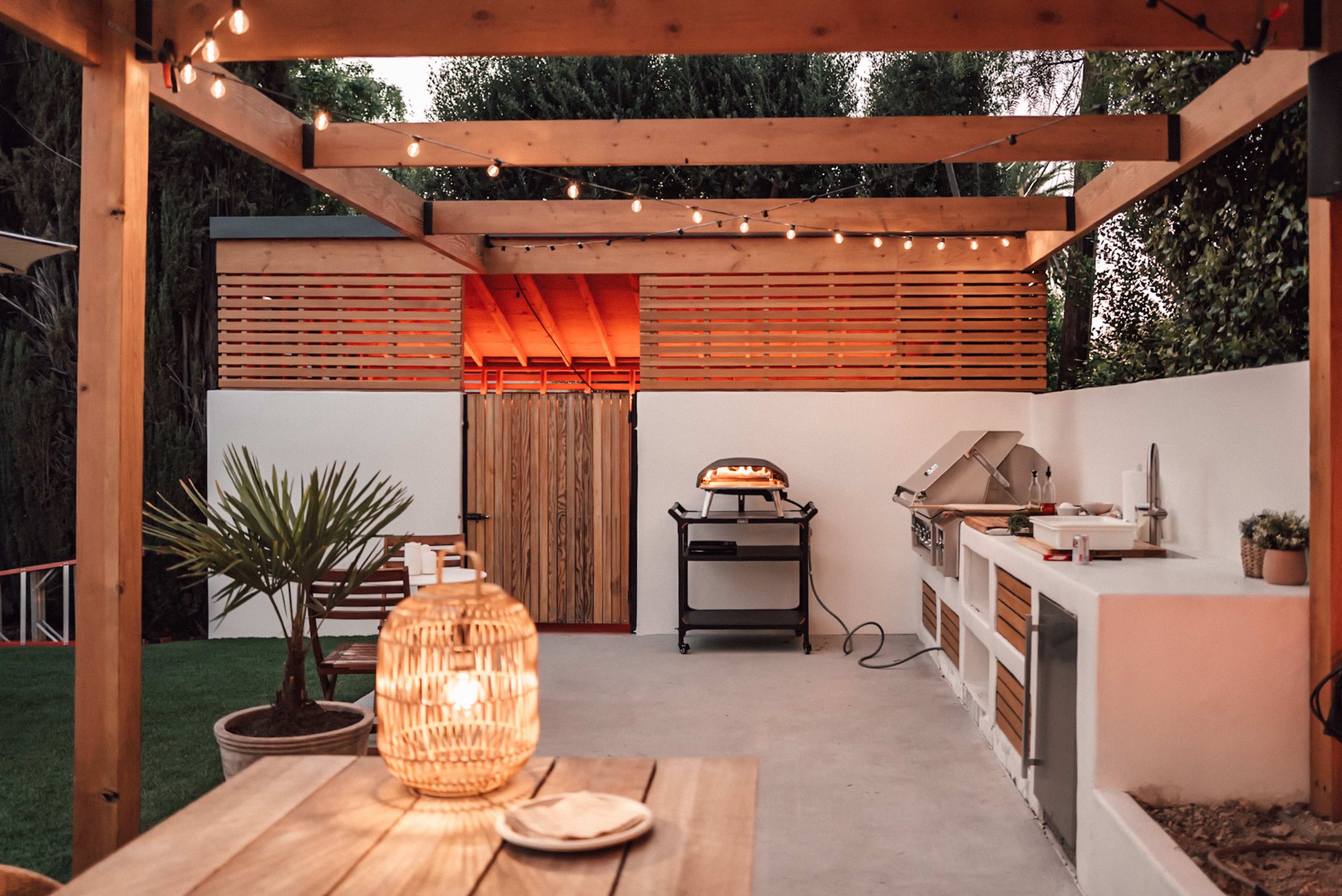 Resort-Style Backyard with Pool, Pergola, Firepit & Outdoor Kitchen Image in Woodland Hills, Woodland Hills, CA