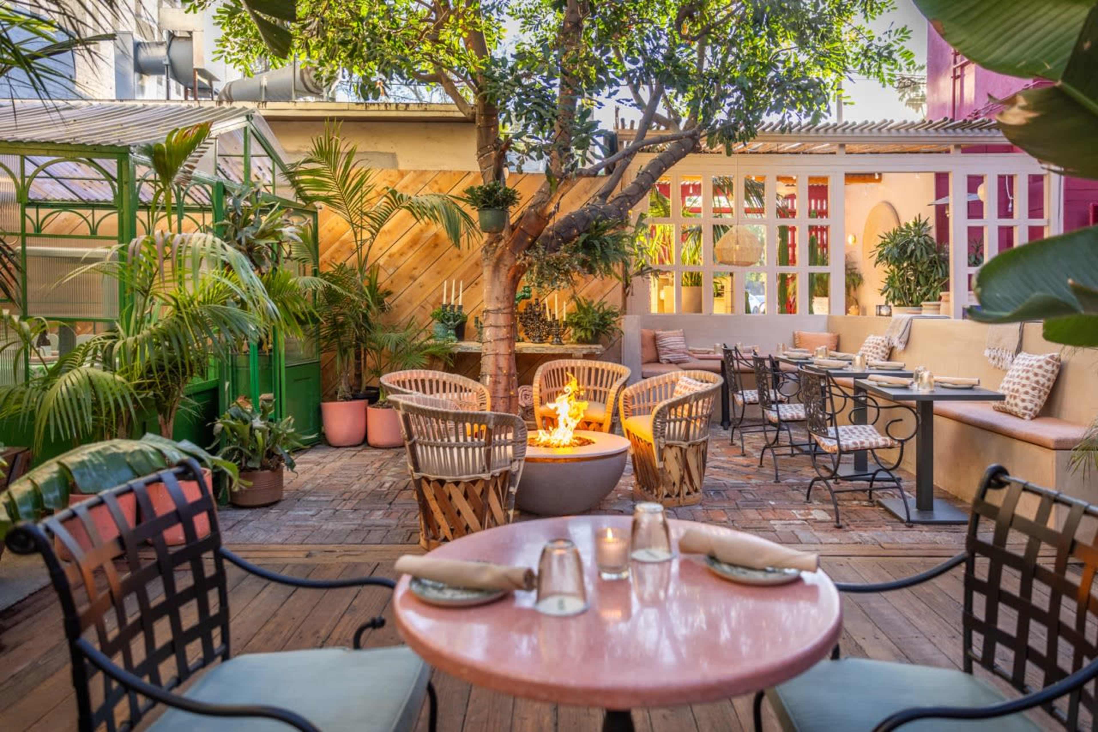 Tropical Patio space nestled between two buildings in the heart of Silverlake Image in Silver Lake, Los Angeles, AS