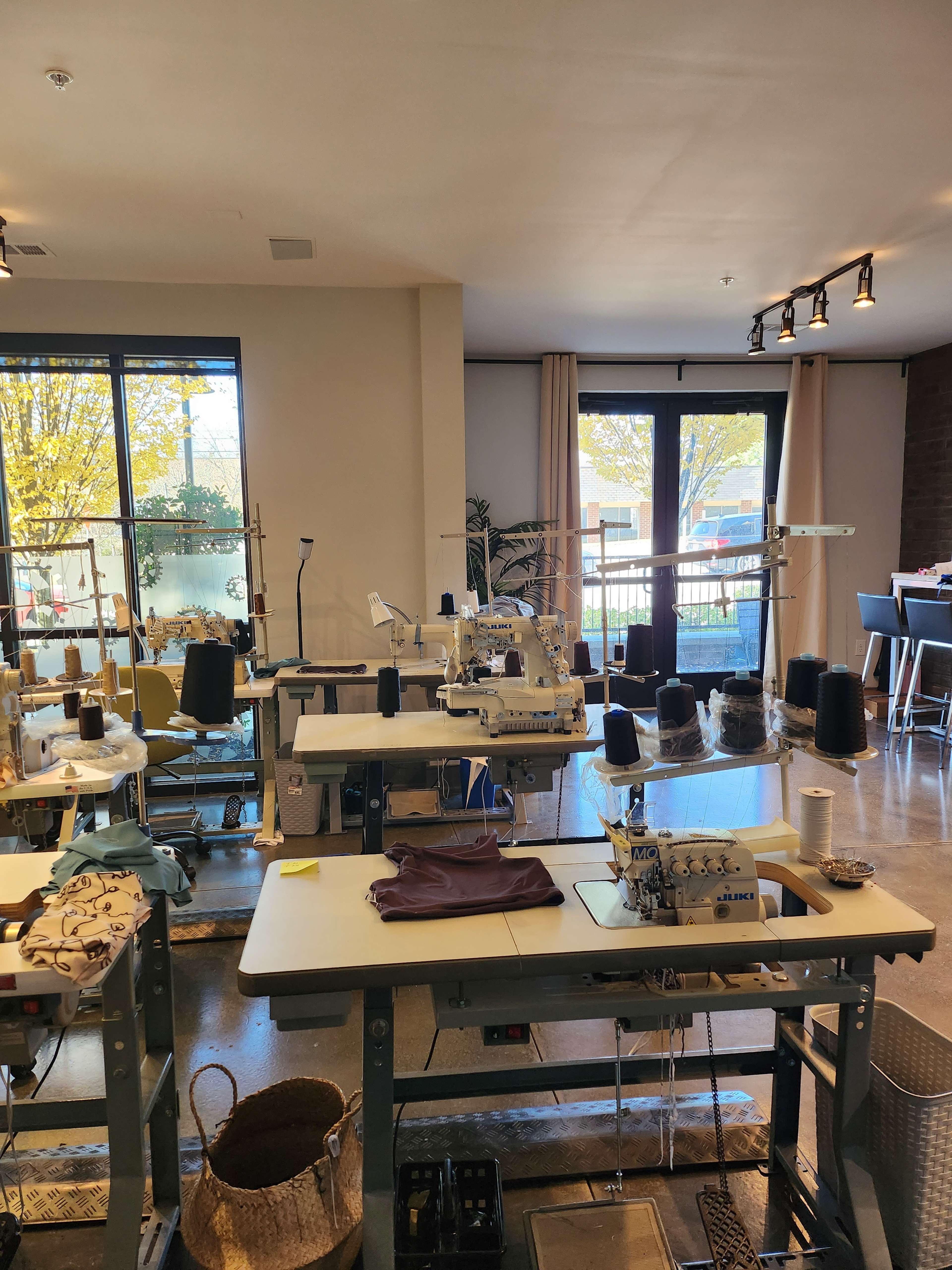Intimate Sewing Studio with Industrial Machines & Photography Wall Image in Duluth, Duluth, GA