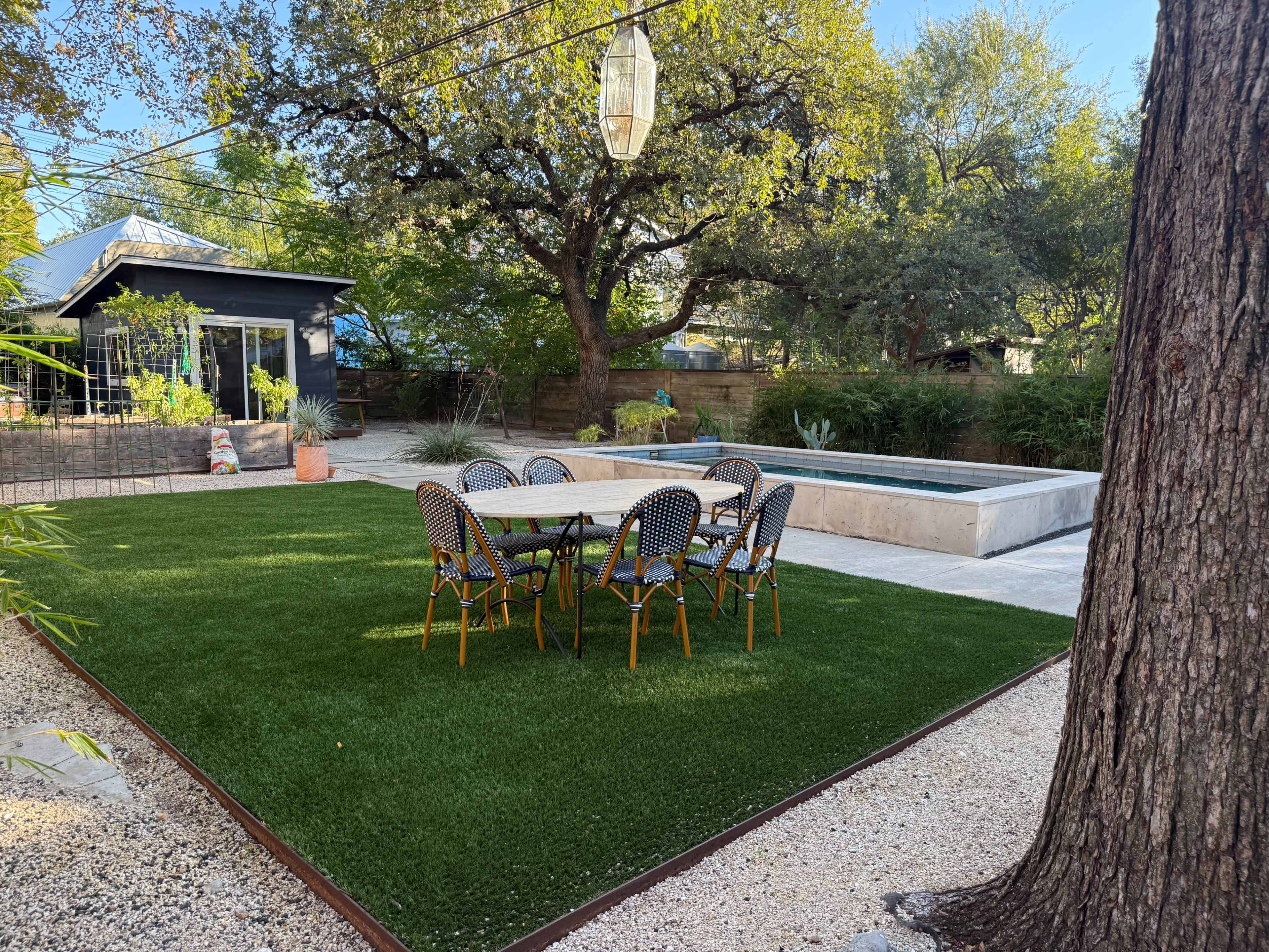 Modern backyard pool oasis Image in Cherrywood, Austin, TX