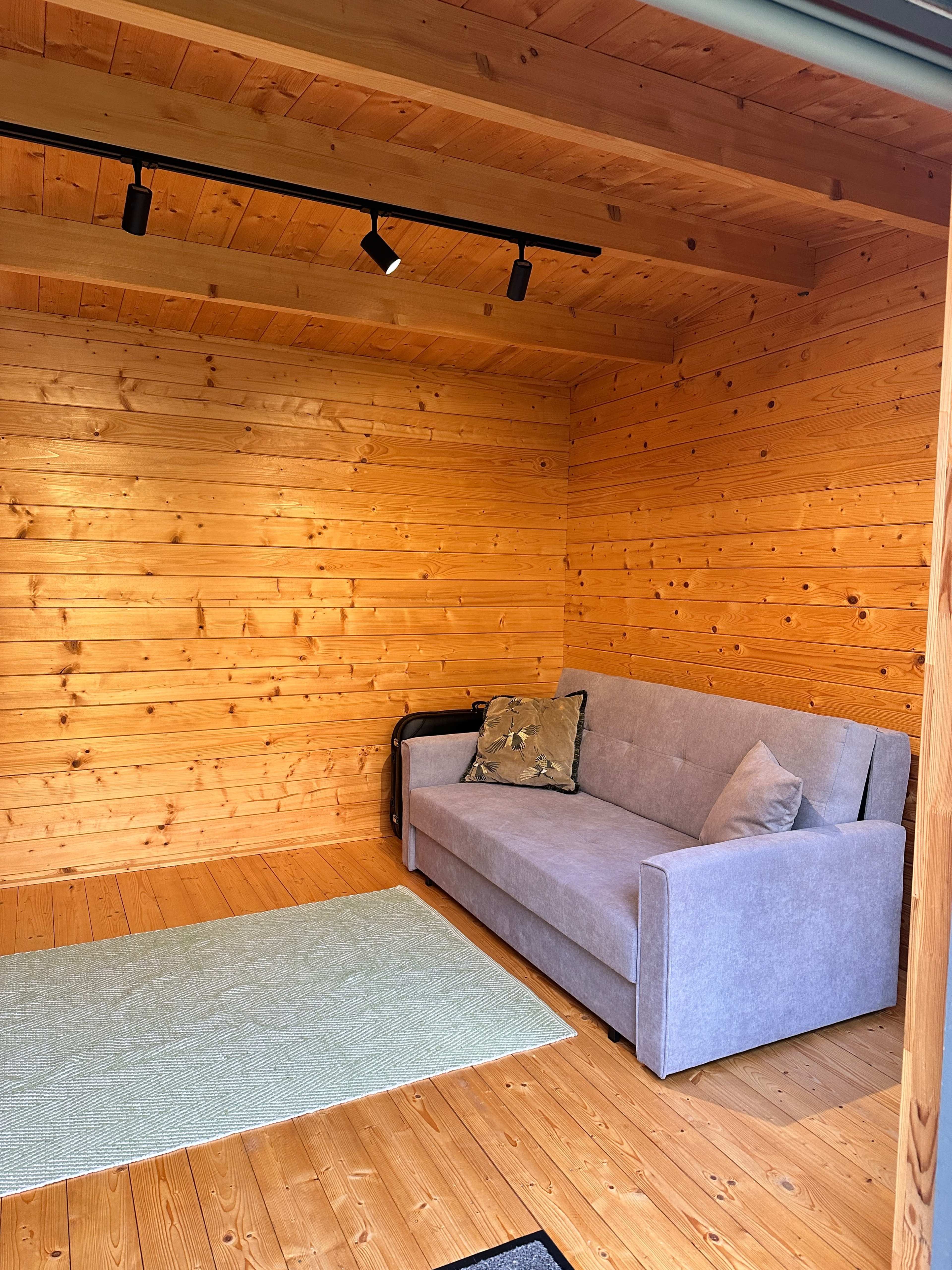 light-filled log cabin with ensuite bathroom Image in Raynes Park, london, ENG