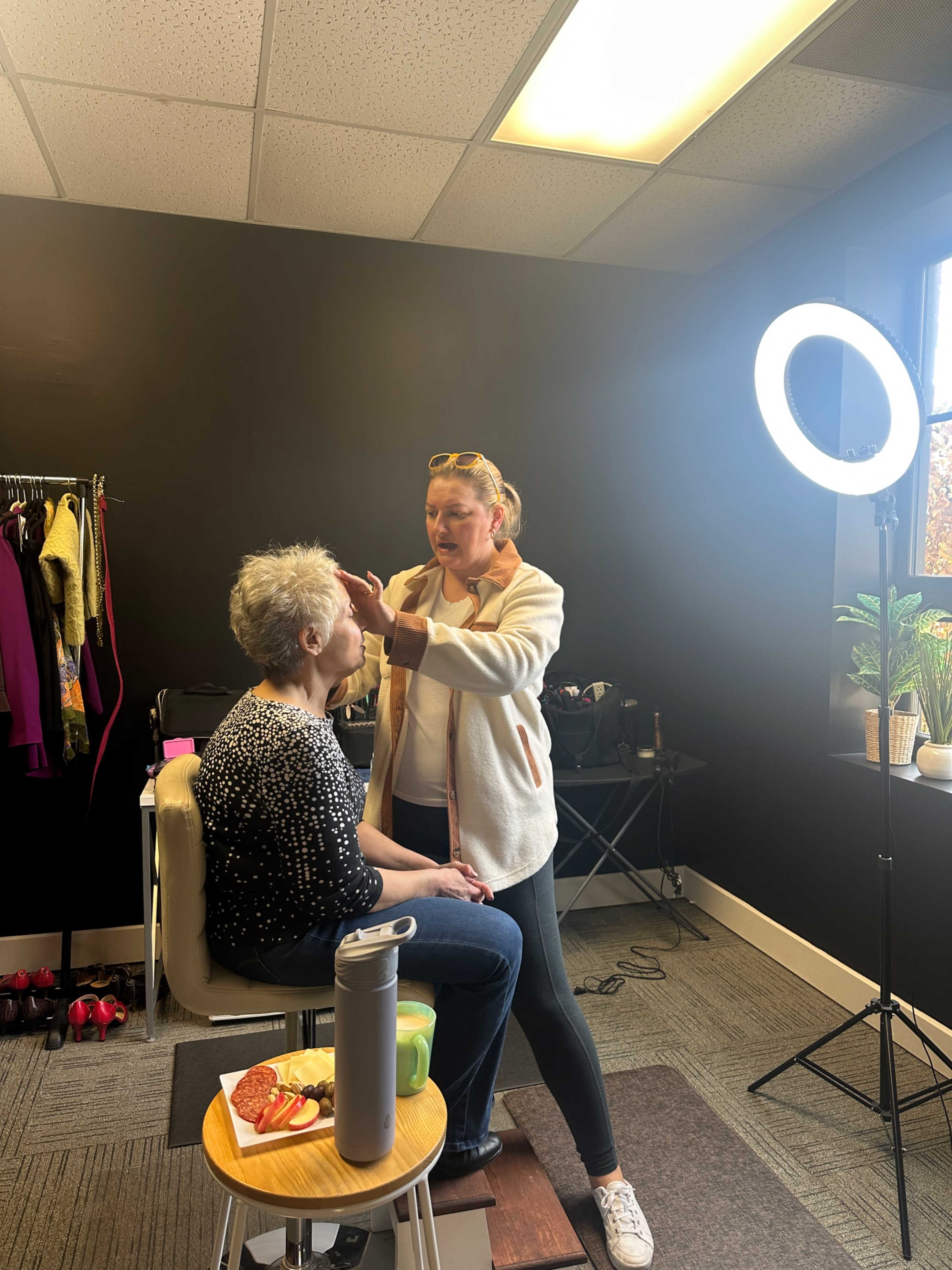 Photo studio with large windows. Two rooms. One is perfect for hair and makeup and branding images. The other has seamless paper, a unique textured wall and couch. Image in Granville Township, Granville, OH