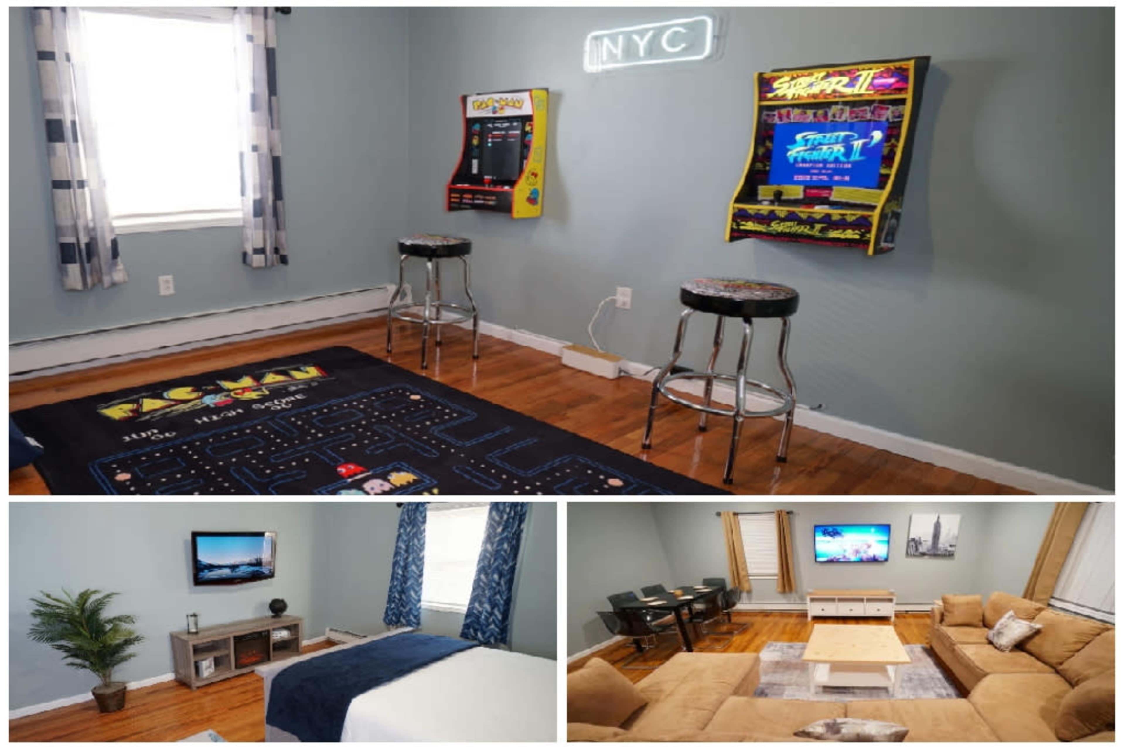 A recreational room featuring arcade machines, a large area rug, a television, a dining table, and a cozy seating arrangement.