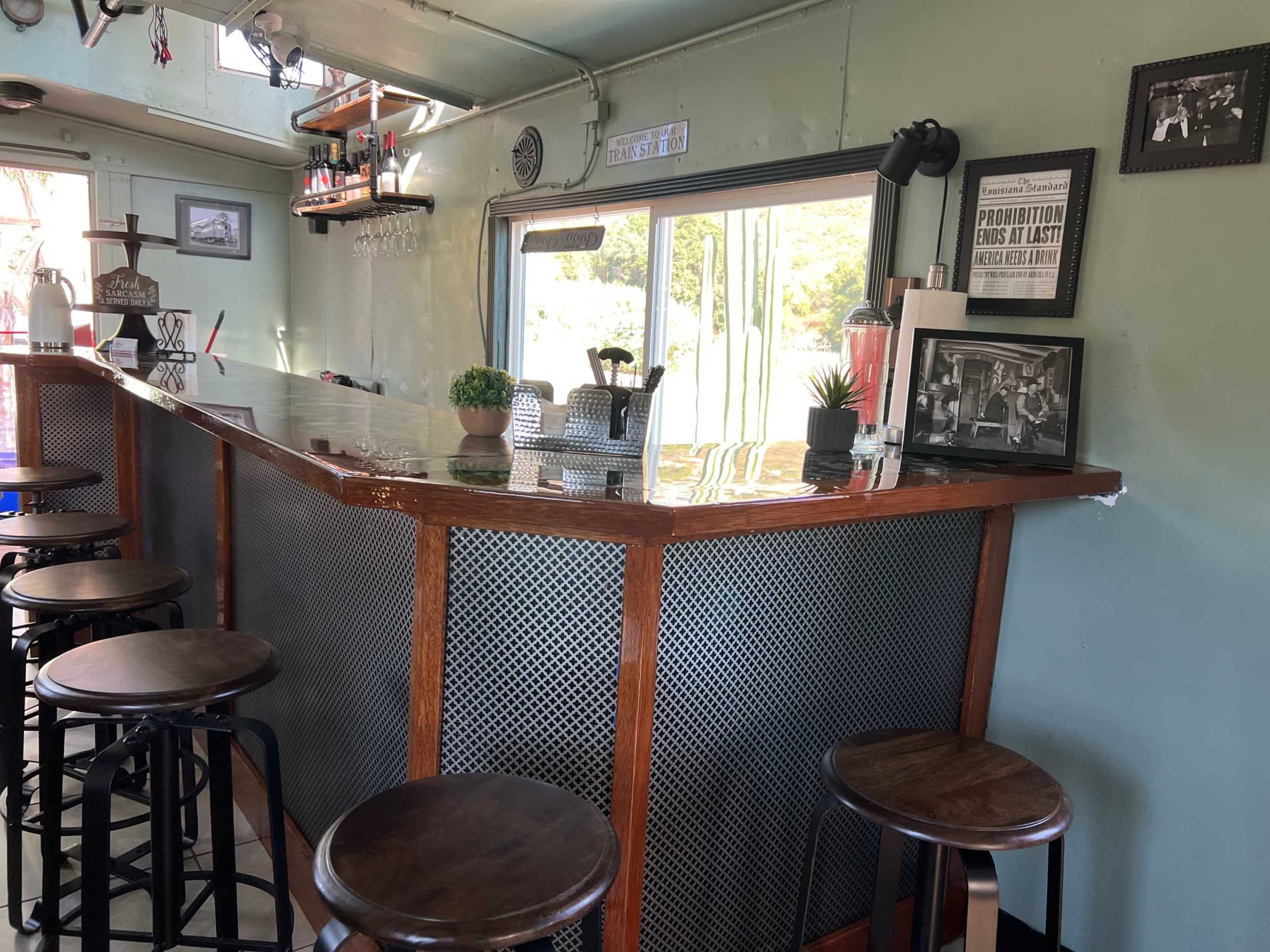 Vintage Train Caboose with Cafe Patio and Fenced Yard Image in , Flinn Springs, CA