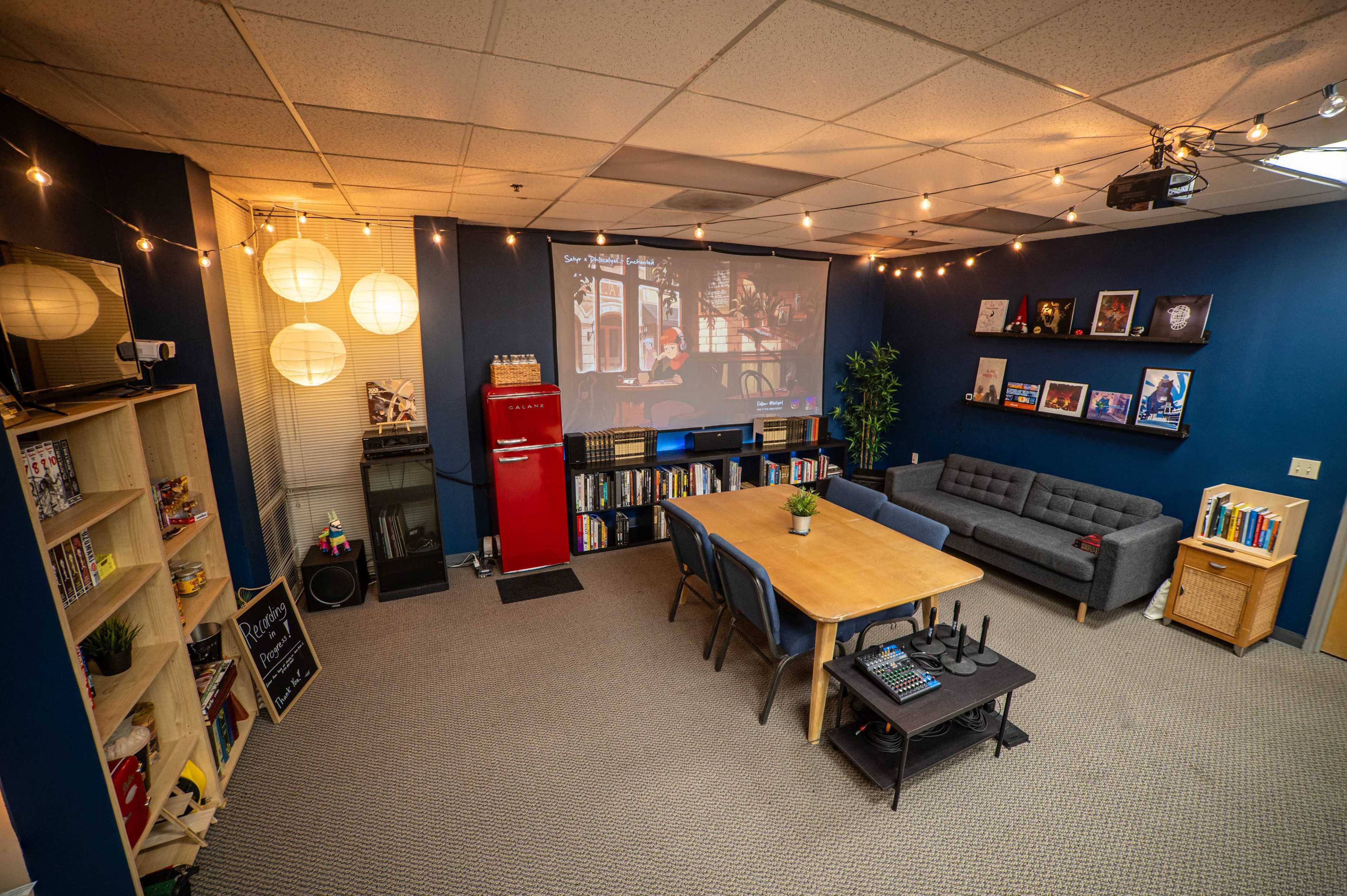 Cozy, Warm Meeting Space with Projector and Writing Materials Image in Northside, Riverside, CA