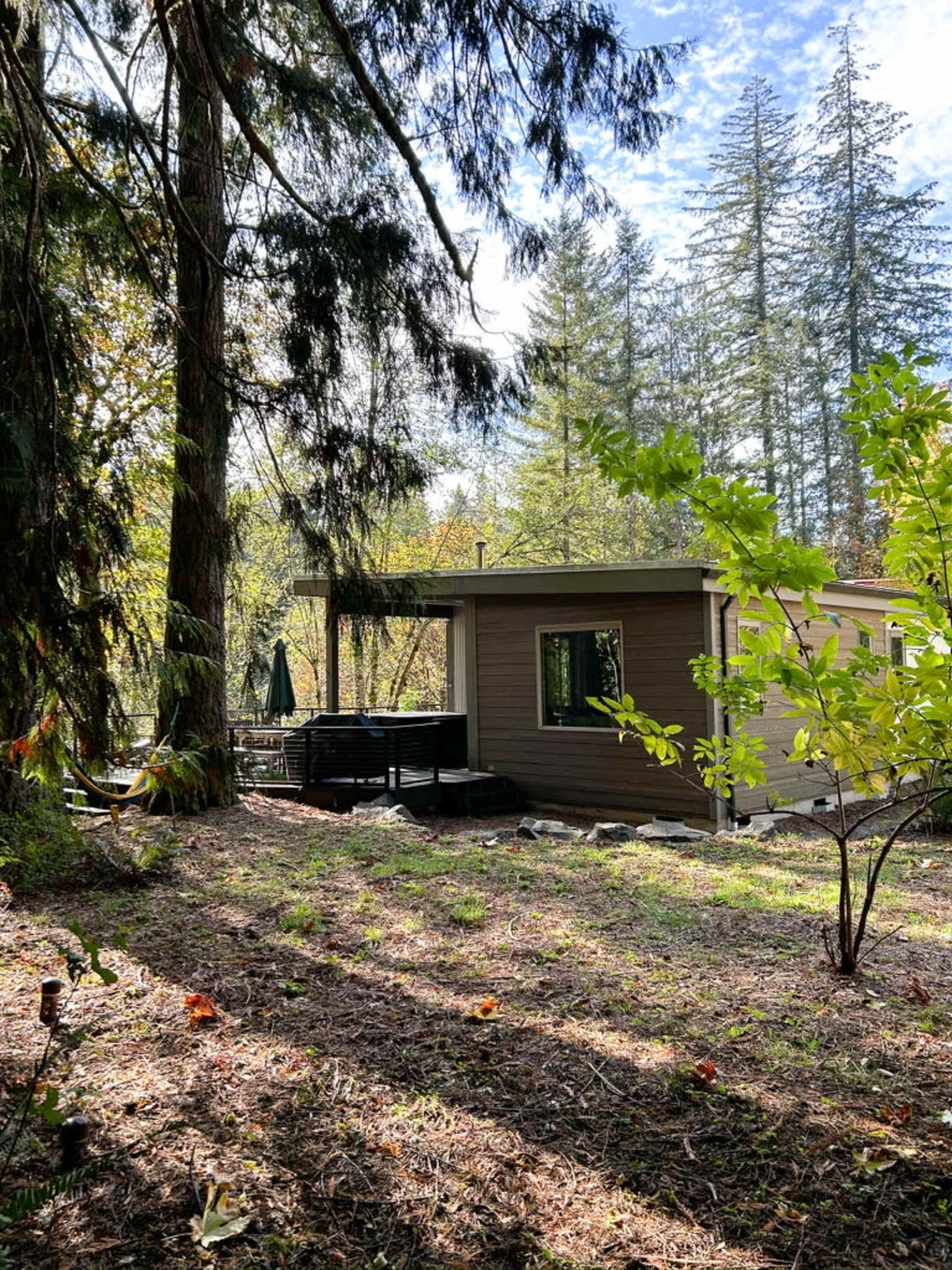 A light-filled River House with private river access and a spacious lawn area. Image in , Washougal, WA