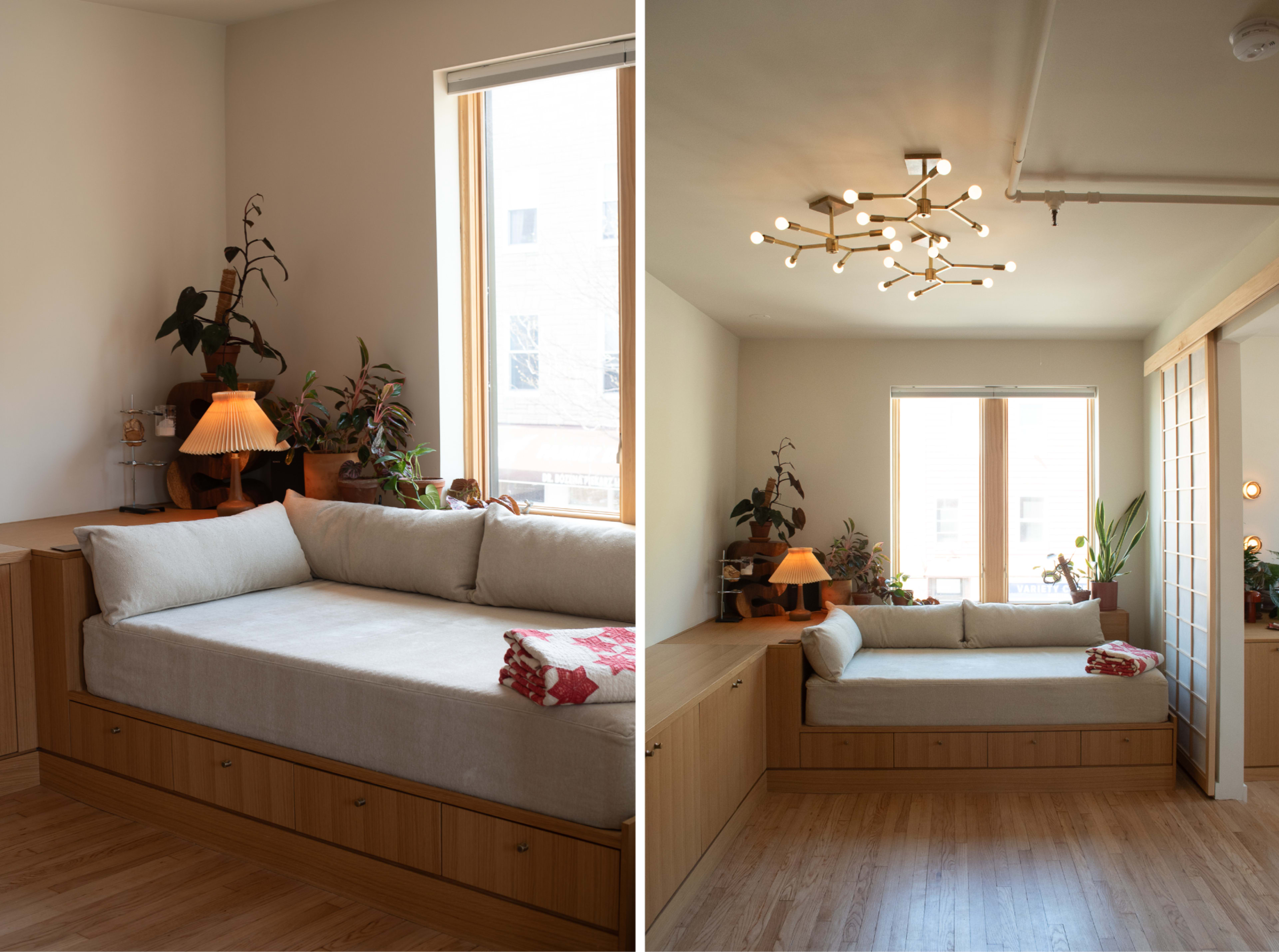 The image shows a cozy nook with a light-colored sofa adorned with plants and a lamp, positioned near large windows in a well-lit room.