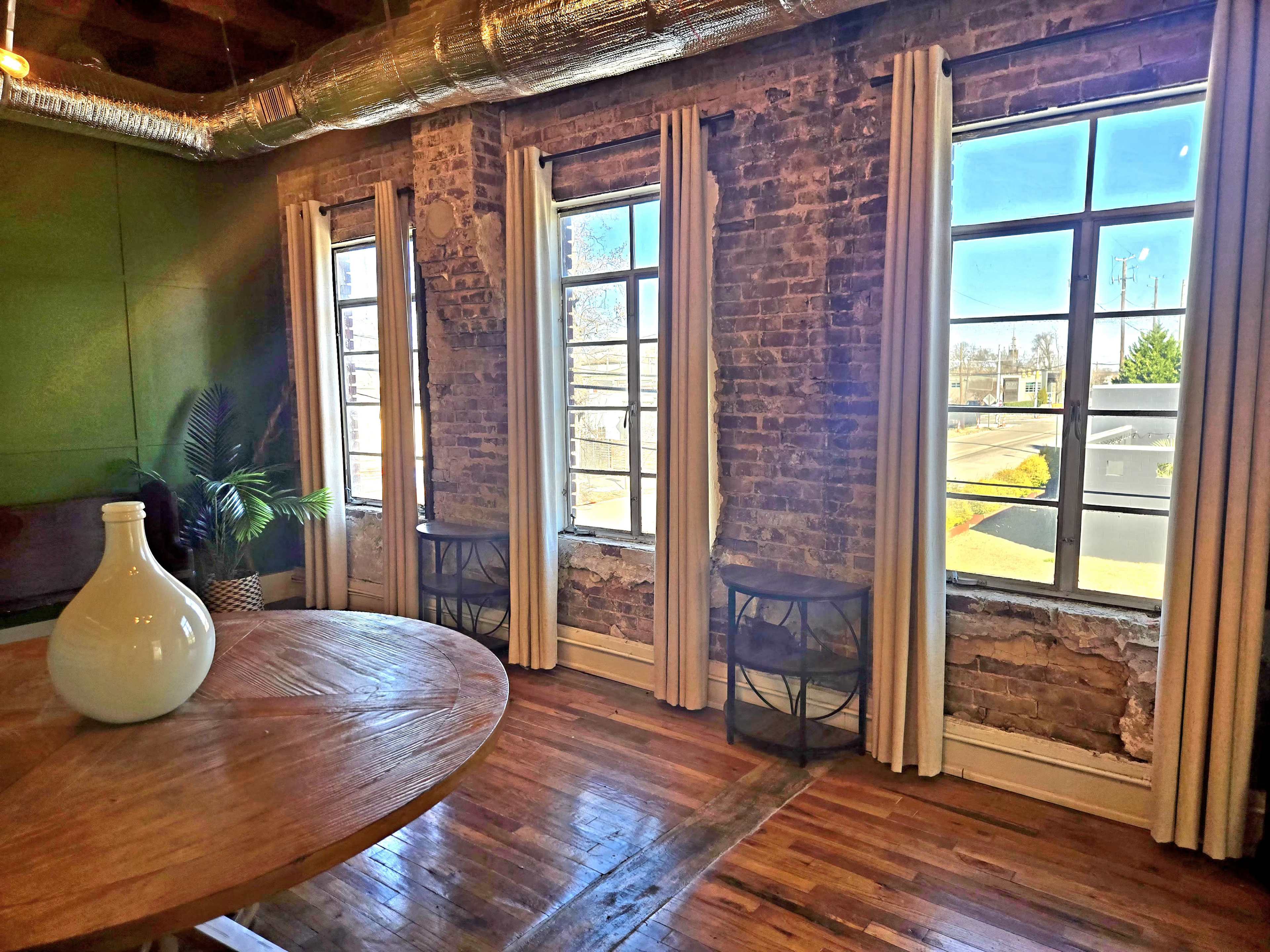 Sunlit Avondale Loft with Exposed Brick and Private Patio Image in East Avondale, Birmingham, AL