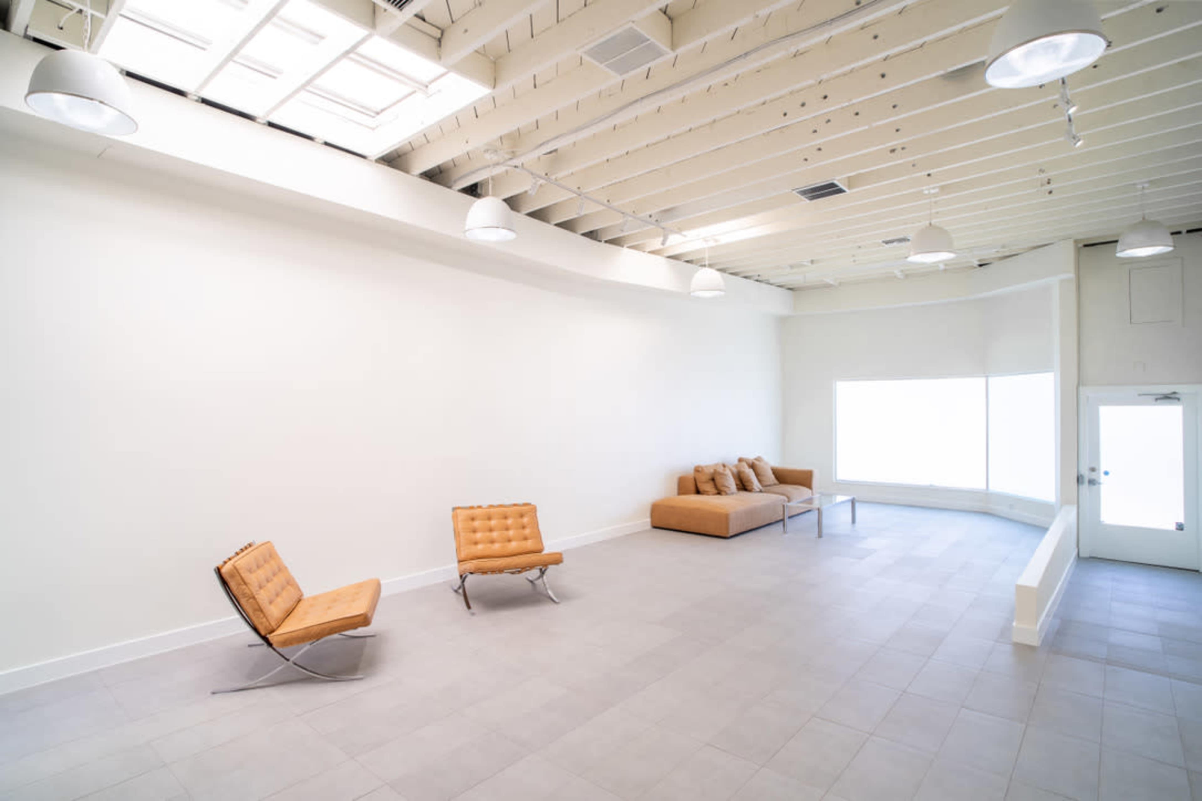 Melrose Fairfax District Minimalist Daylight Photo and Video Studio Space with Modern Minimalist Furnishings and Backdrops Image in Beverly Grove, Los Angeles, CA