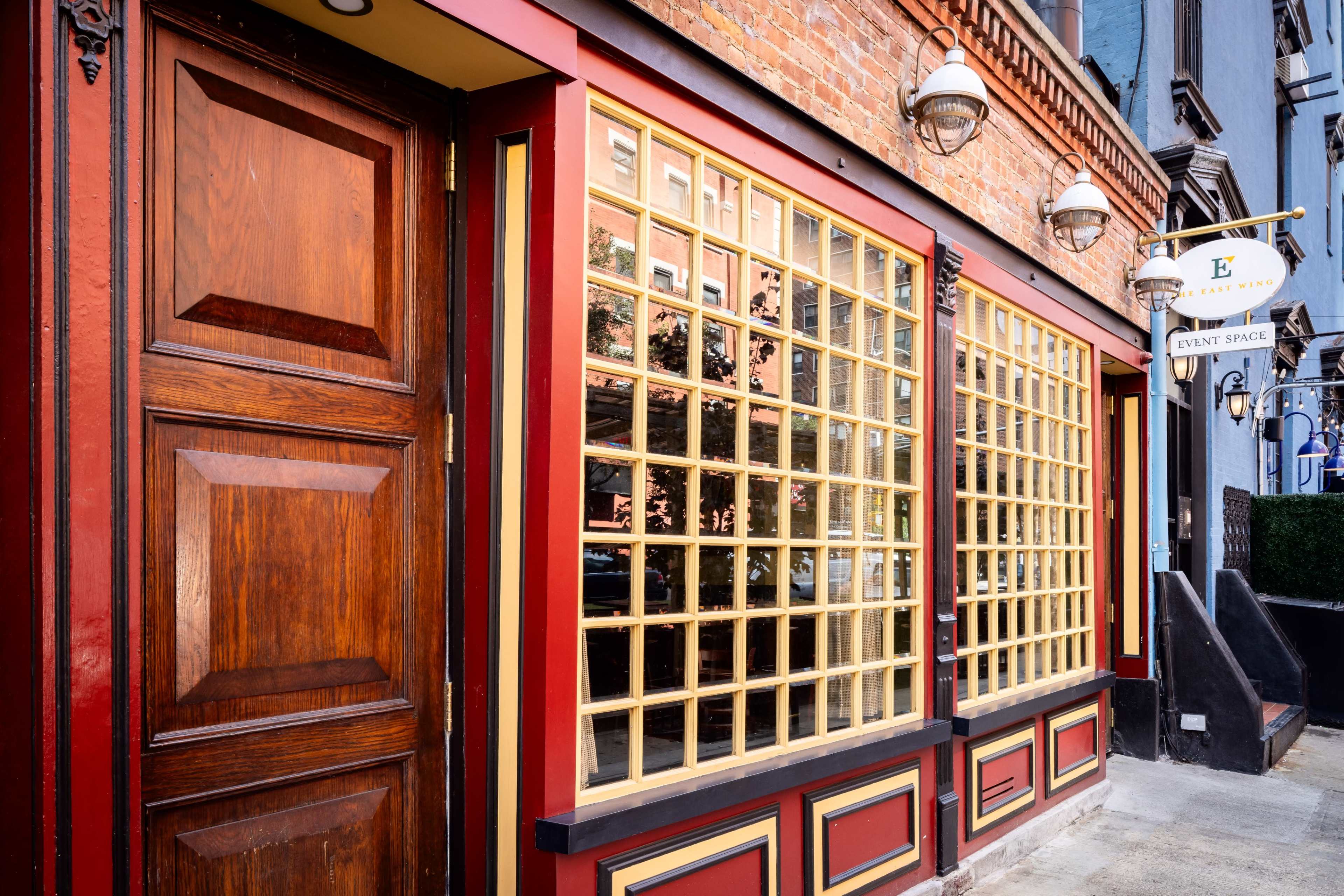 The East Wing - a mid-century bar set flooded with natural light Image in Lenox Hill, New York City, NY