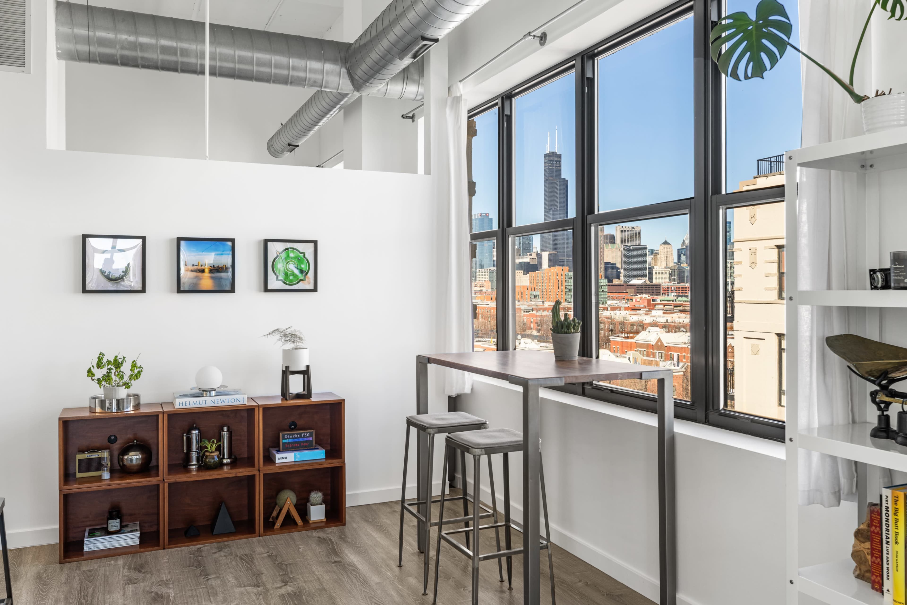 Modern & Historic Loft w/ 20ft Ceilings, South+East Facing Windows, Skyline Views, and Private Balcony Image in Near West Side, Chicago, IL