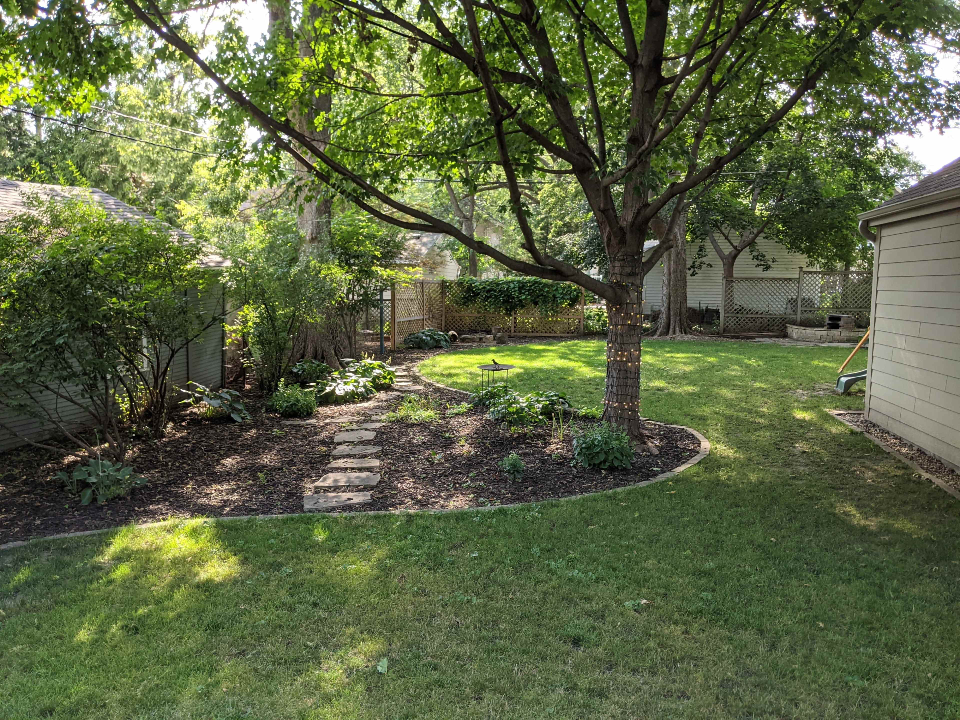 Lovely Backyard in Beaverdale with Pergola Porch, Perfect for Photo and Video Shoots Image in Drake, DES MOINES, IA