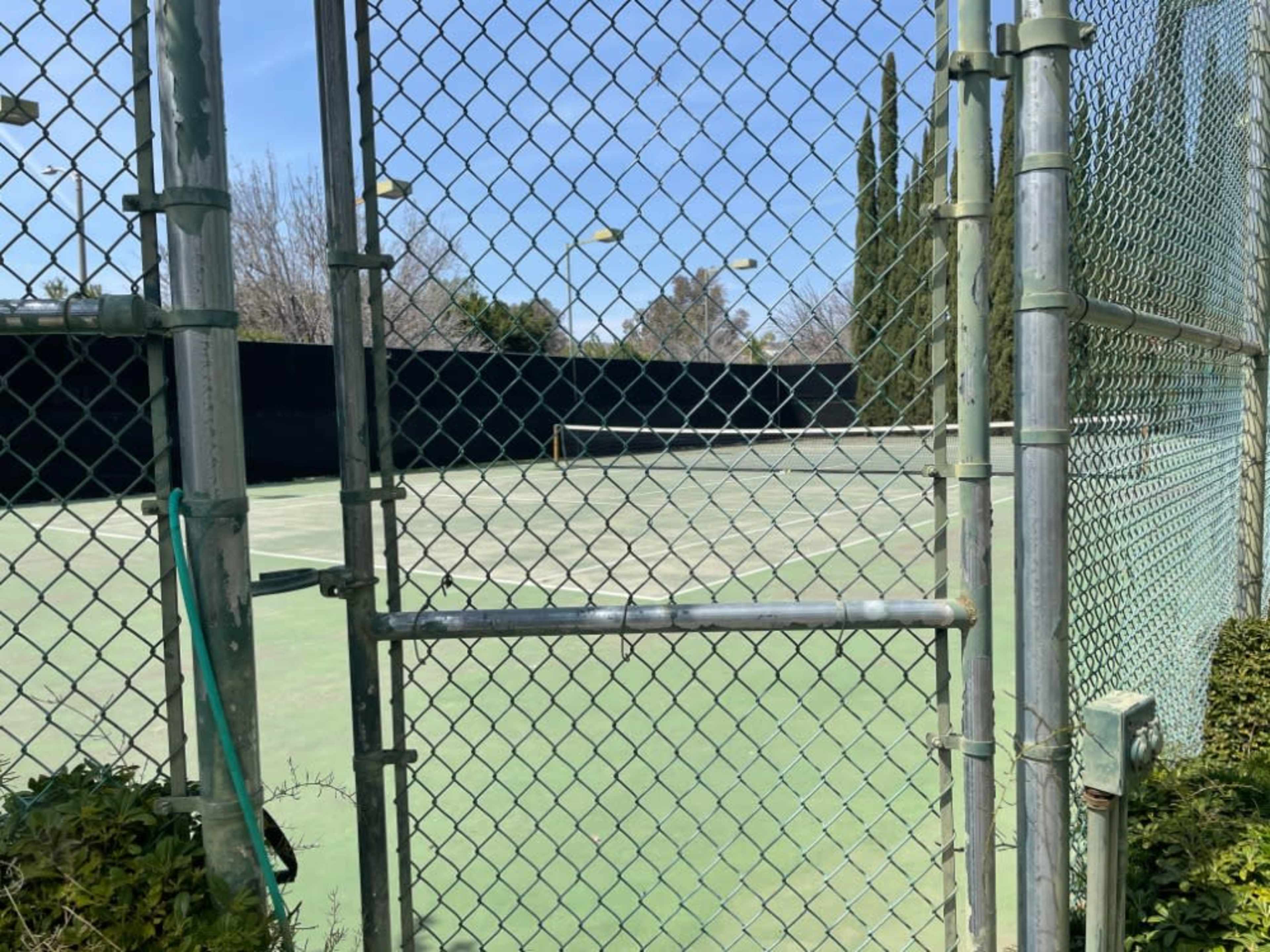 tennis court in back yard