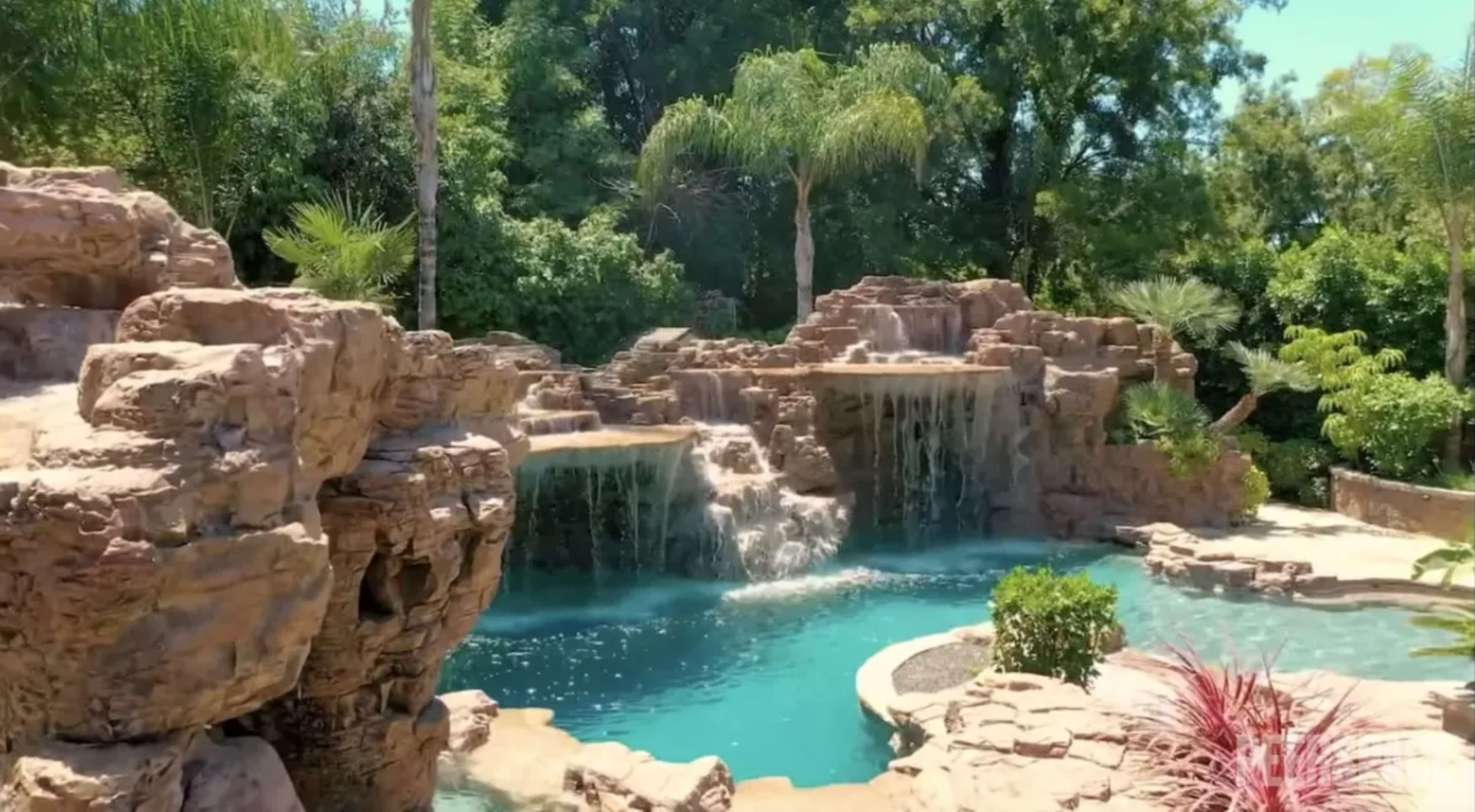 Beautiful Vegas type pool with waterfall and hot tub. Image in Valley Village, Valley Village, CA