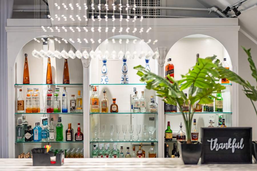 Dream SF event setup with chandeliers and round tables