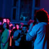 Singer performing to live audience